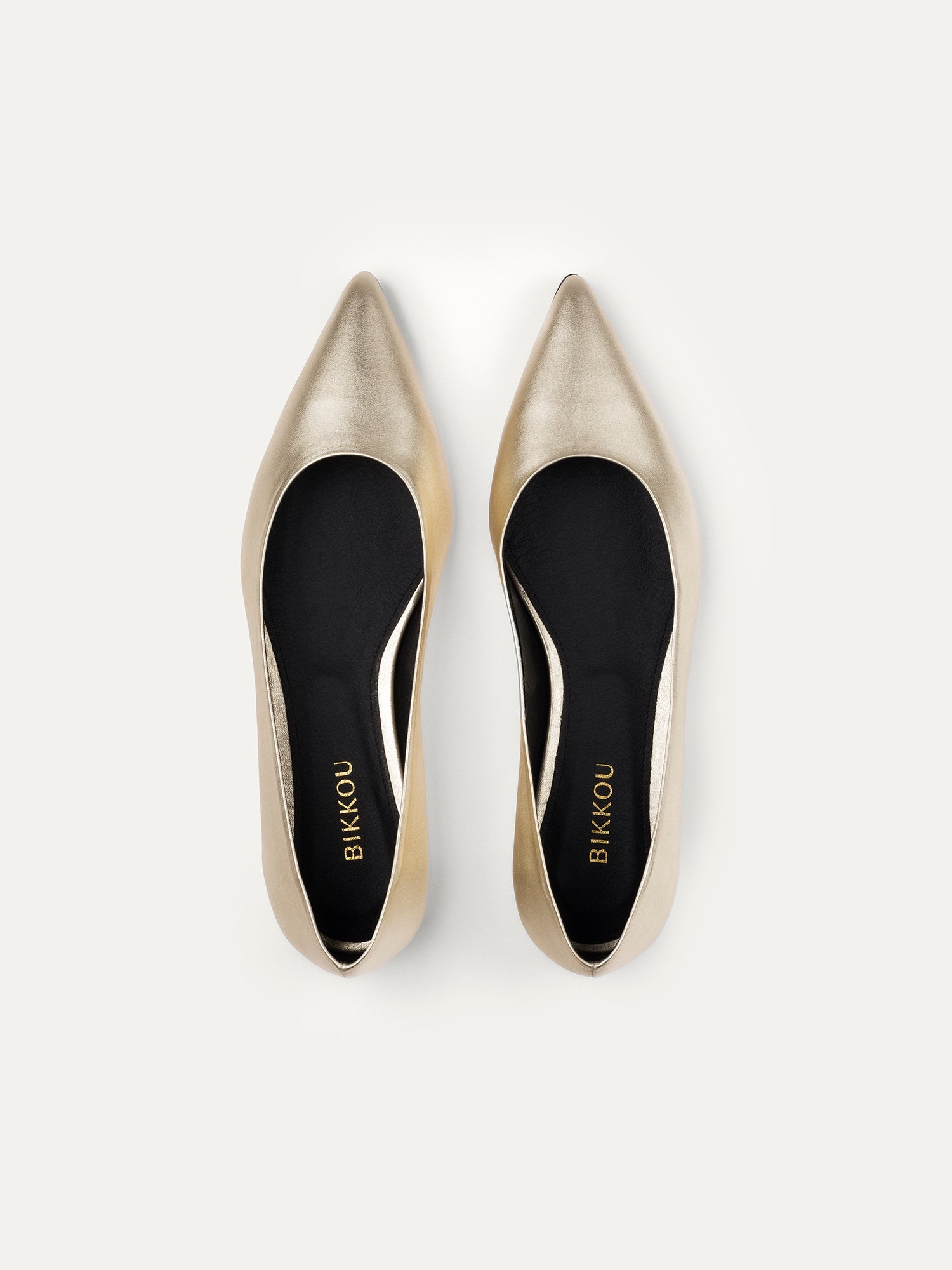 Bikkou 10:30AM Running Between Offices vegan light gold pointy ballerina top view