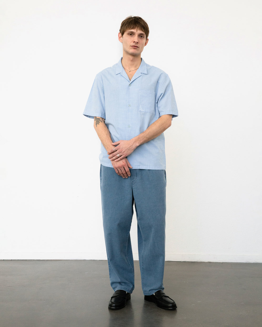Blue bowling shirt made from 100% organic cotton by Rotholz