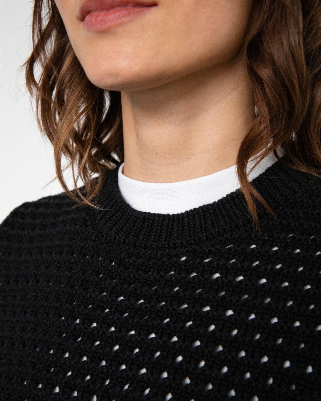 Black knitted vest made of 100% organic cotton by Rotholz