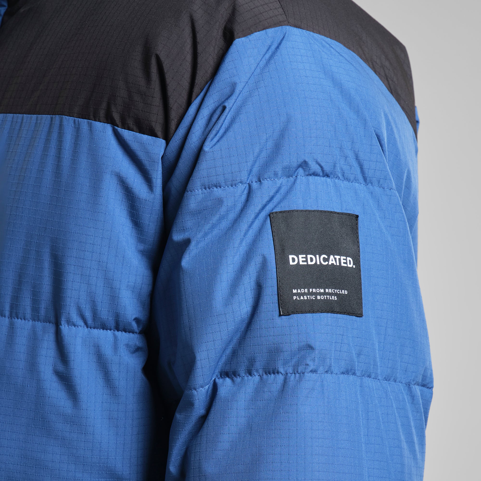 Aoraki down vest made from 100% recycled nylon by ECOALF in metallic beige