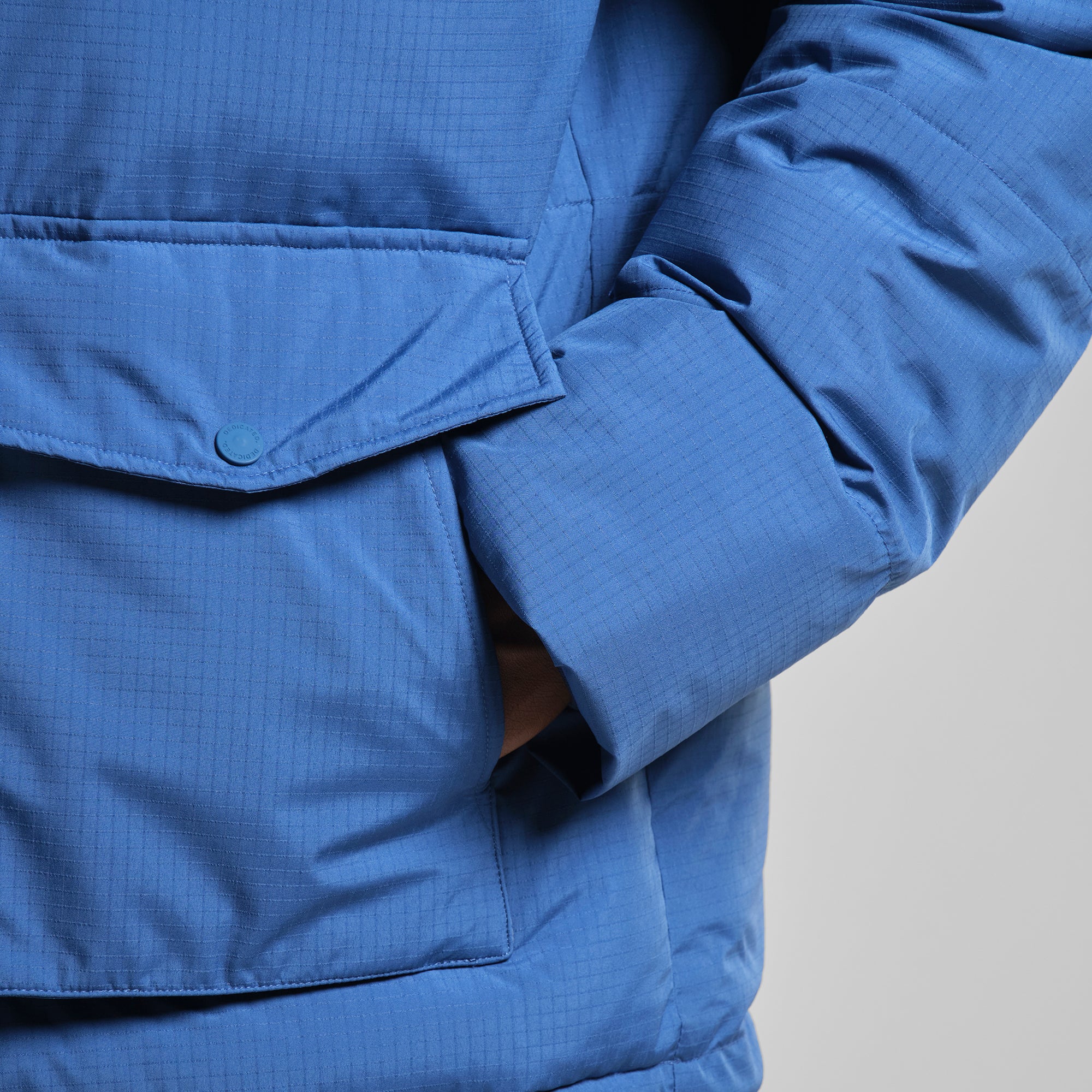 Aoraki down vest made from 100% recycled nylon by ECOALF in metallic beige