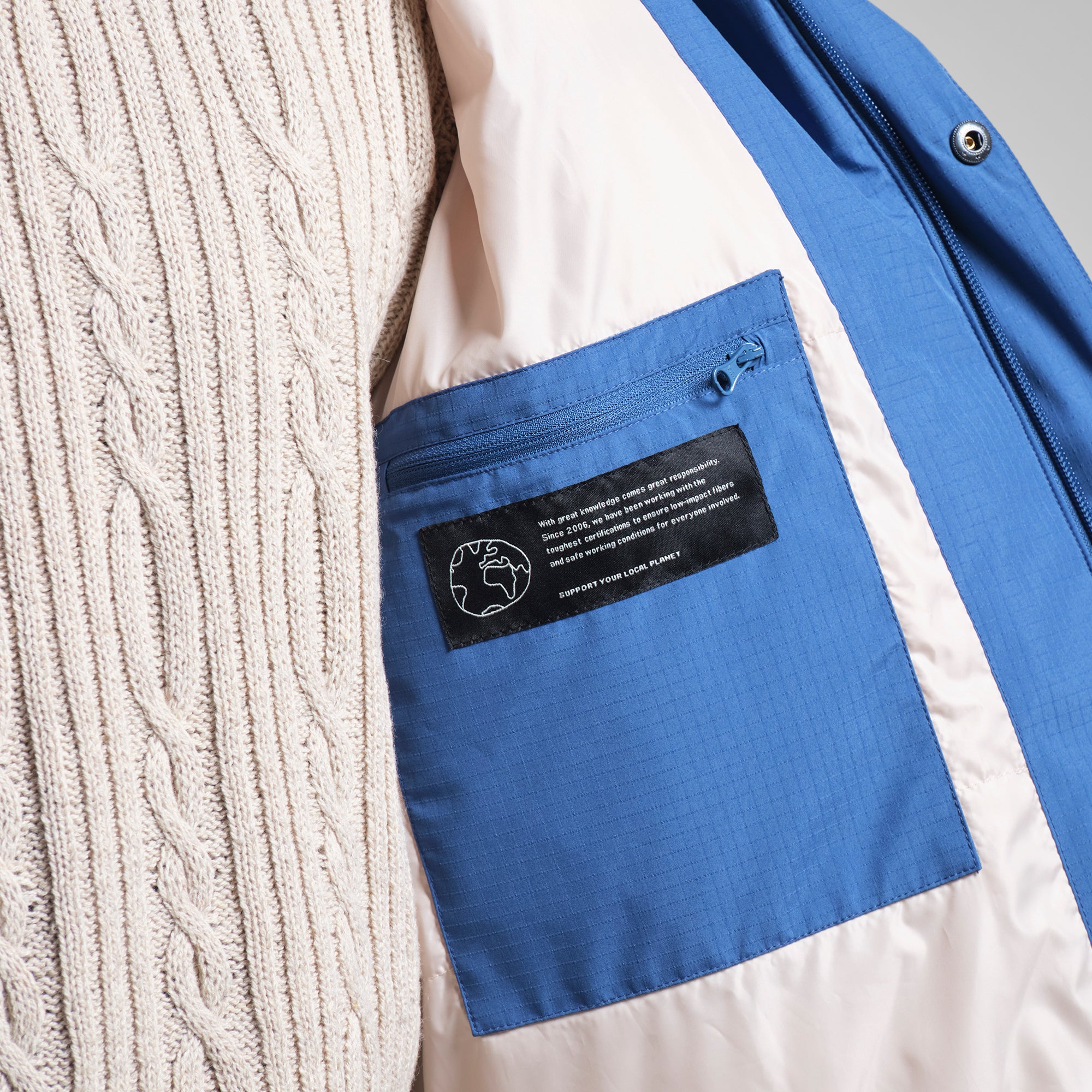 Aoraki down vest made from 100% recycled nylon by ECOALF in metallic beige