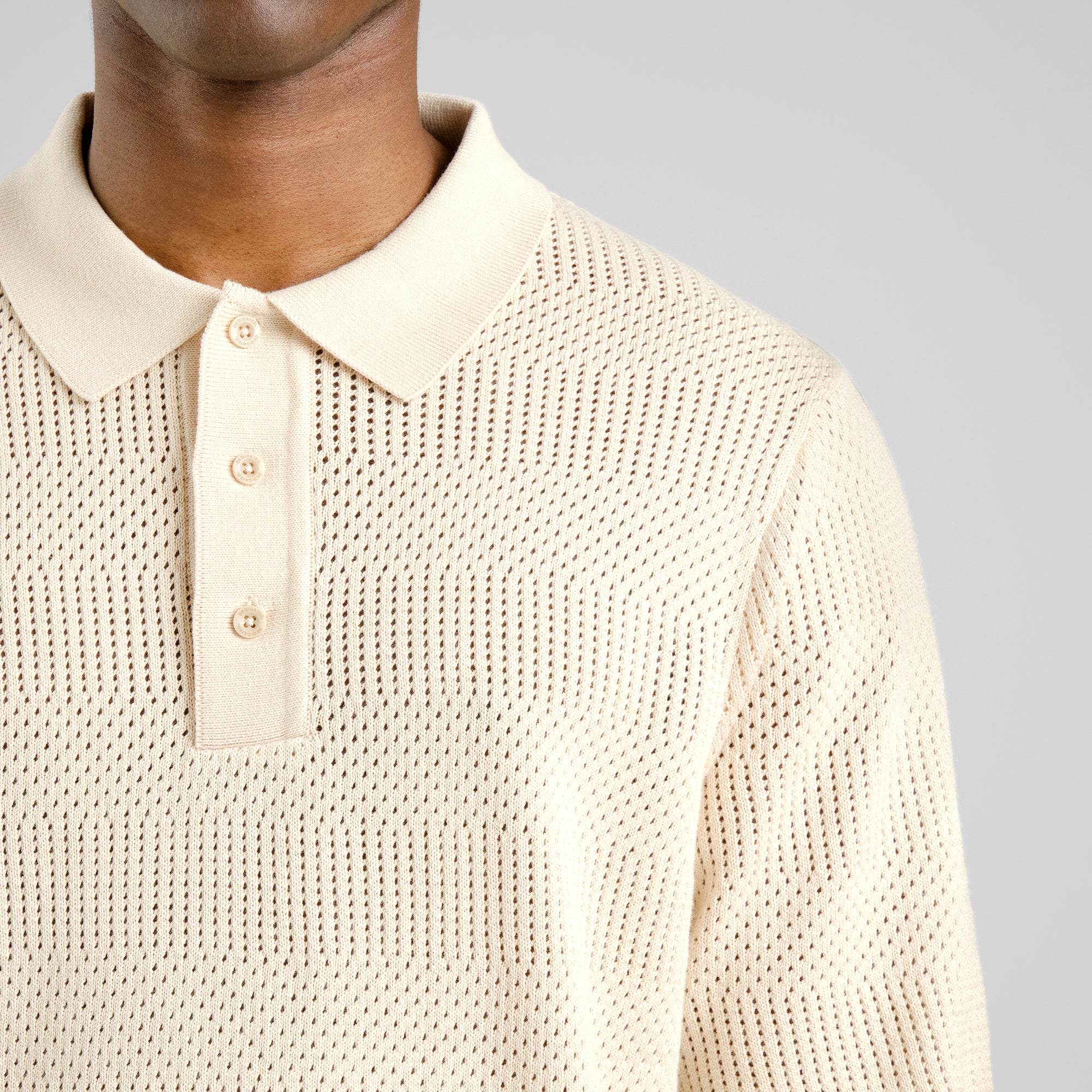 Knitted polo shirt Nogersund in beige made of organic cotton by Dedicated
