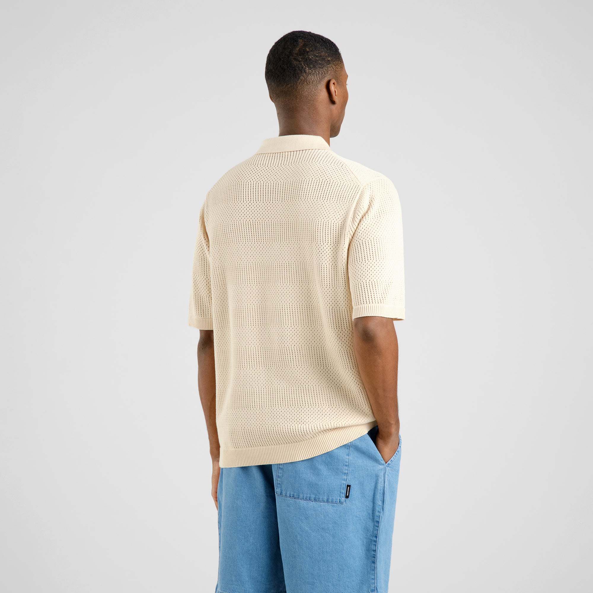 Knitted polo shirt Nogersund in beige made of organic cotton by Dedicated