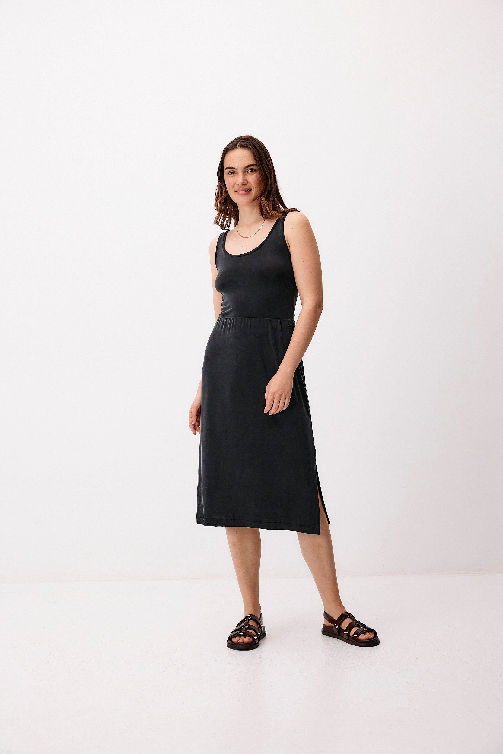 Black cupro midi skirt by Moya Kala