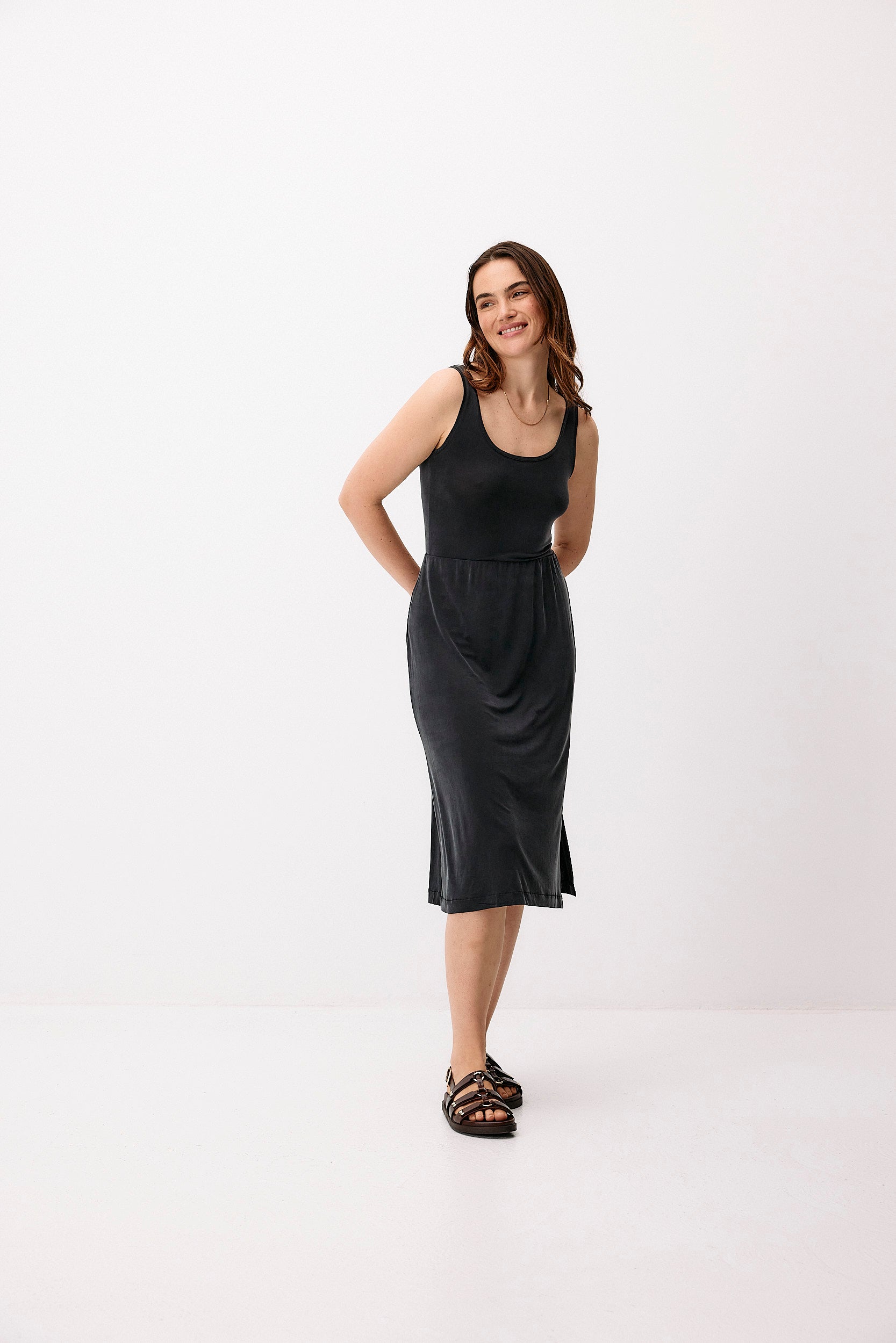 Black cupro midi skirt by Moya Kala