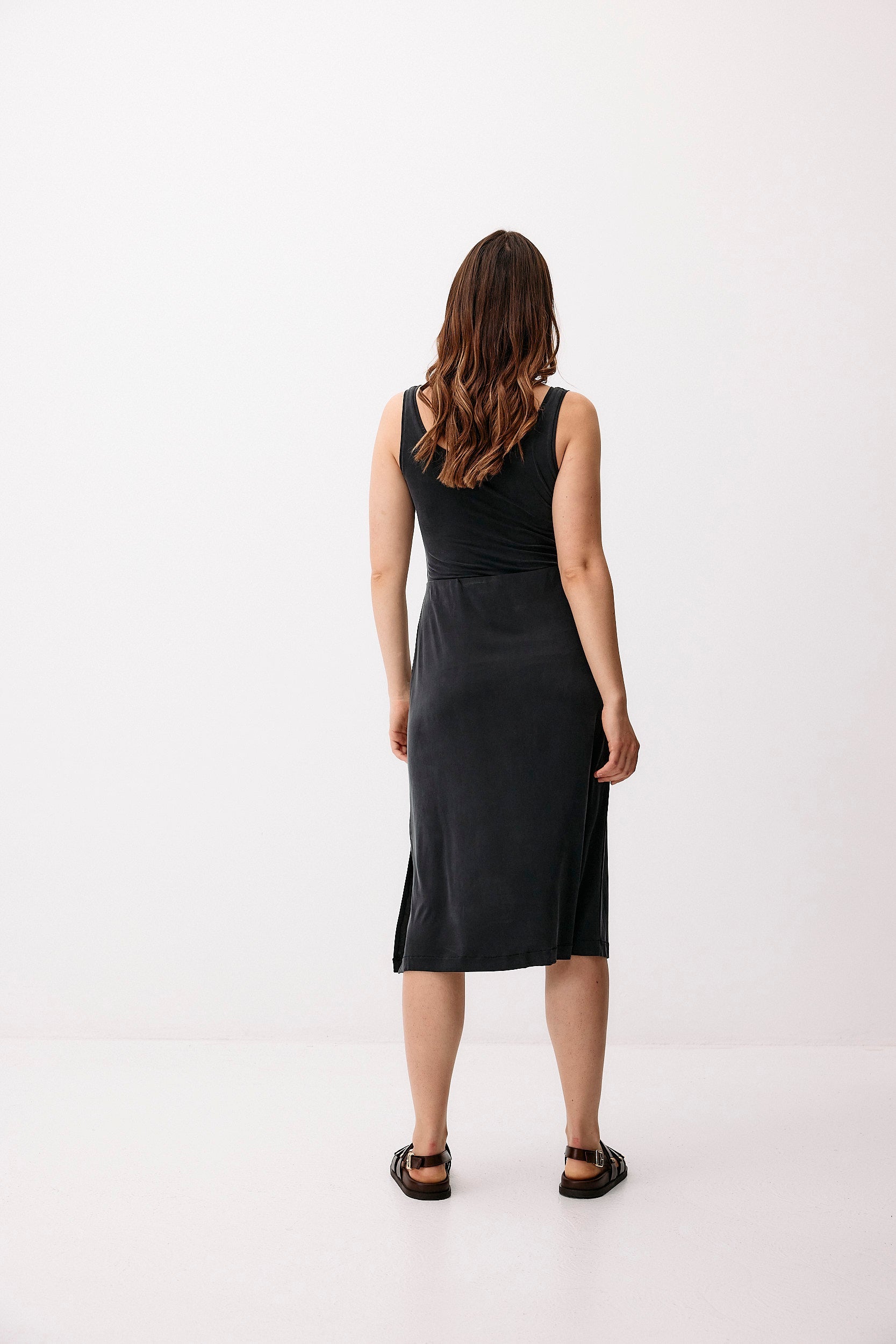 Black cupro midi skirt by Moya Kala