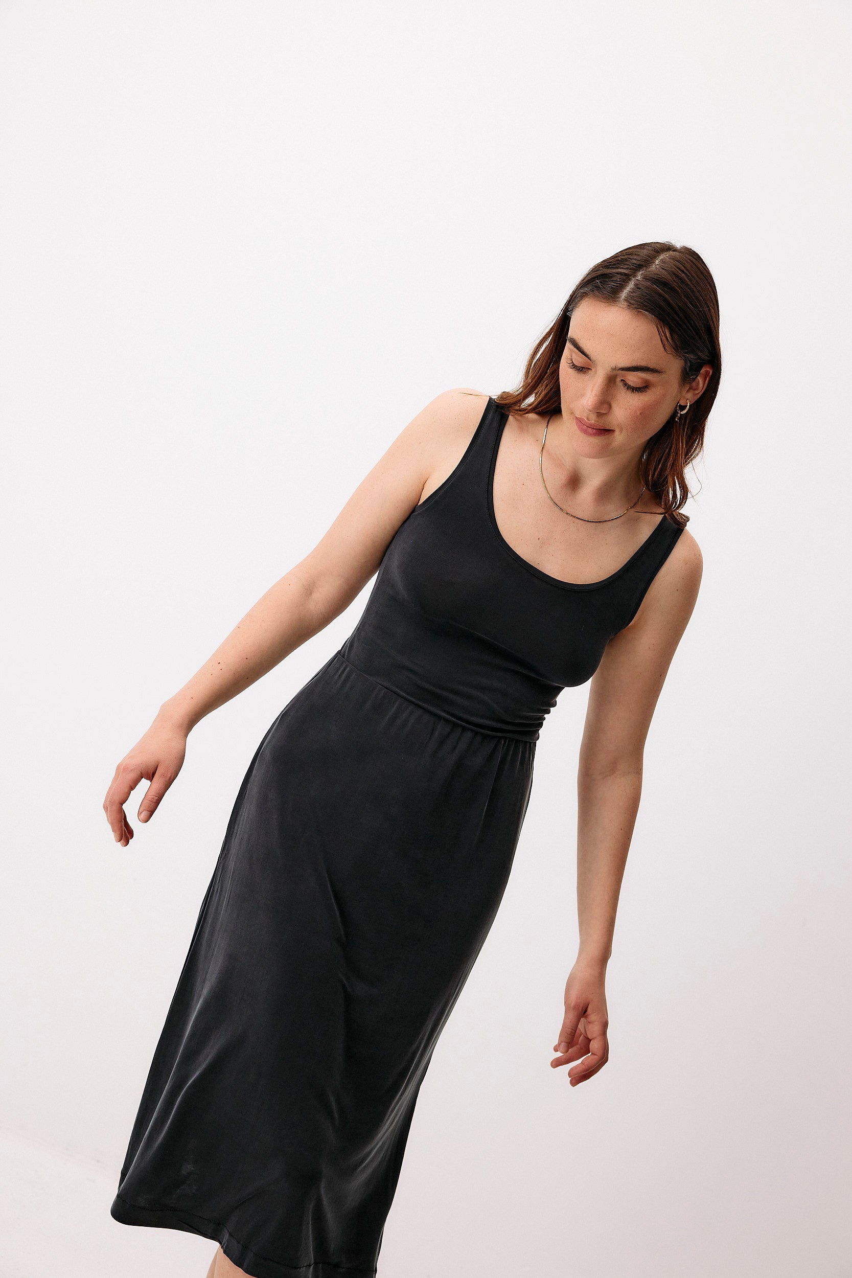 Black cupro midi skirt by Moya Kala