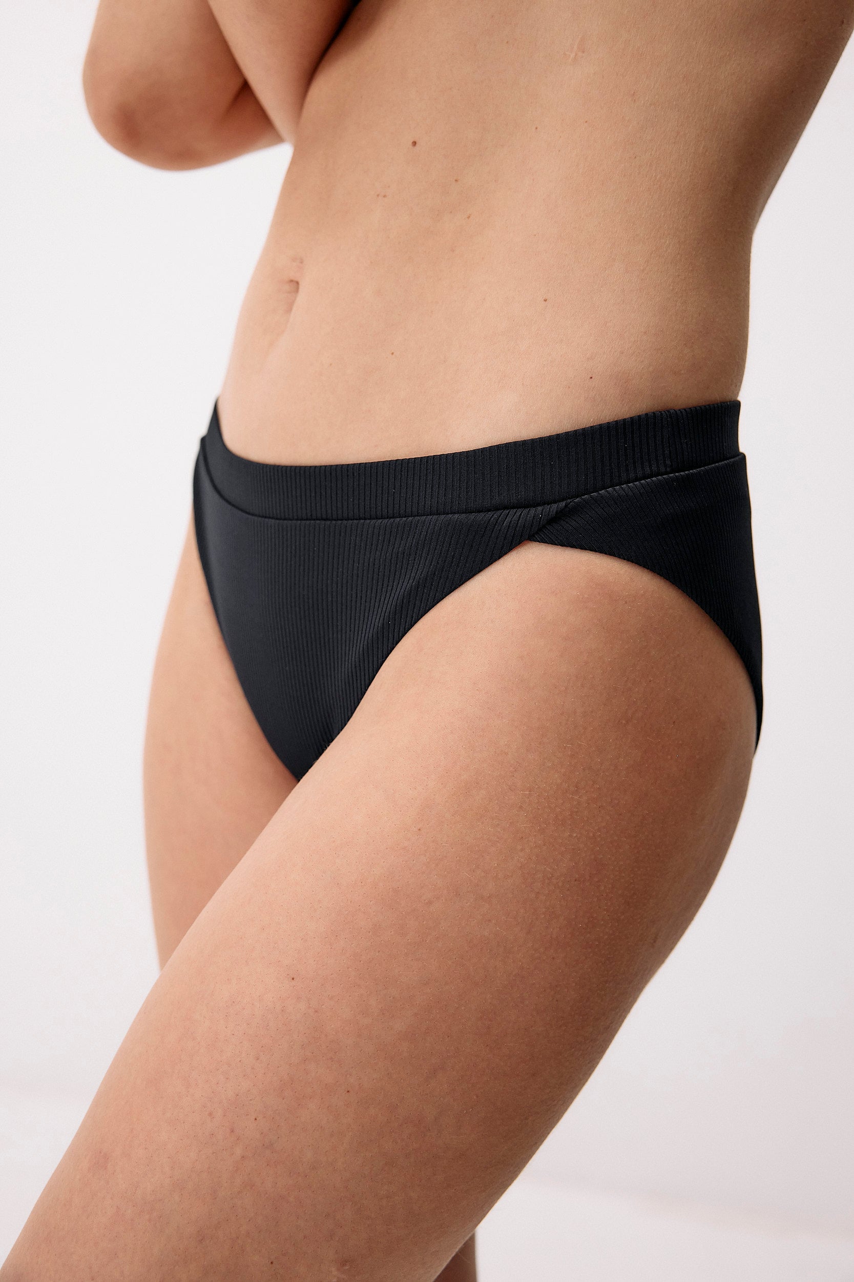 Dark blue hybrid bikini bottom made of recycled polyamide by Moya Kala