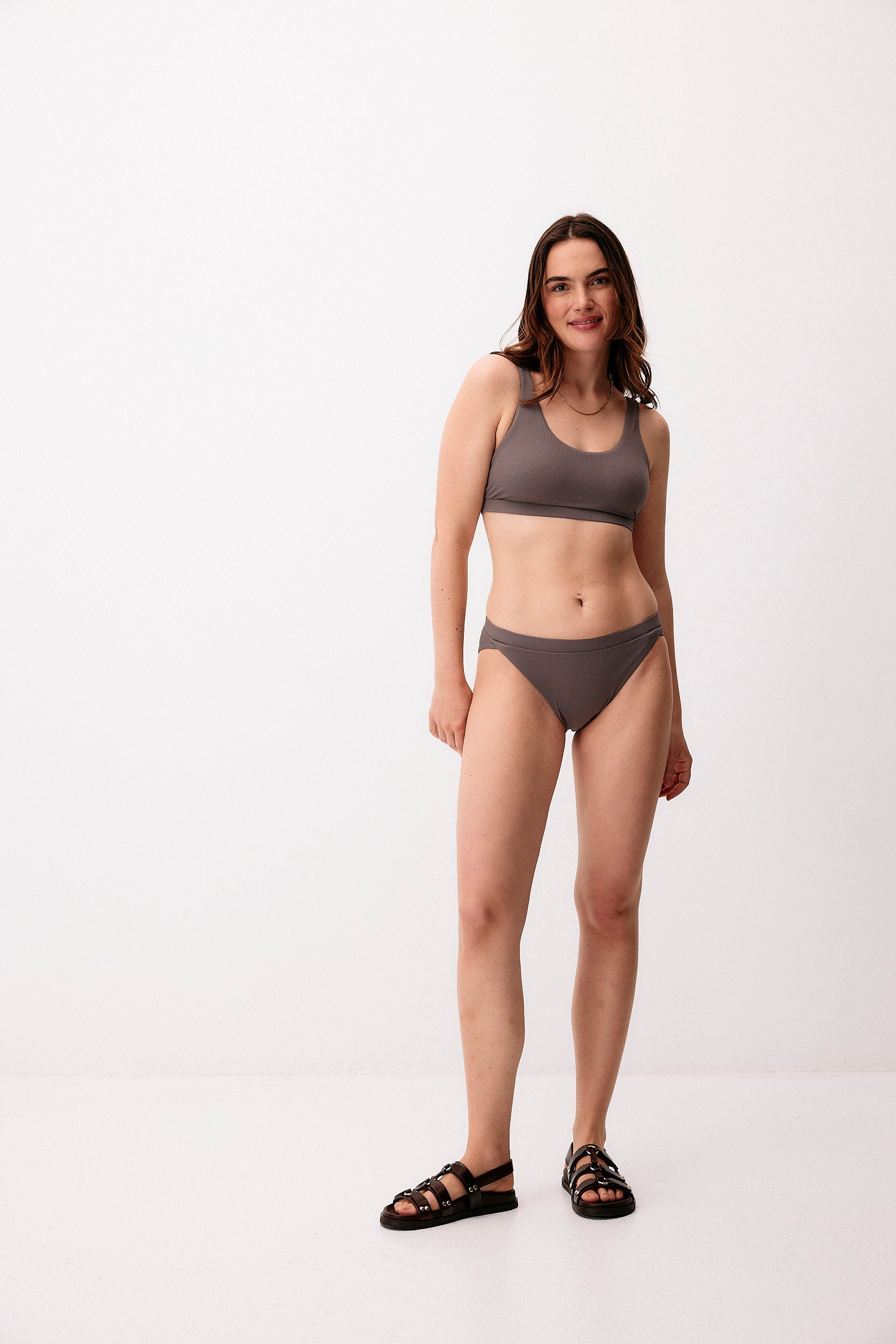 Grey hybrid bikini bottom made of recycled polyamide by Moya Kala