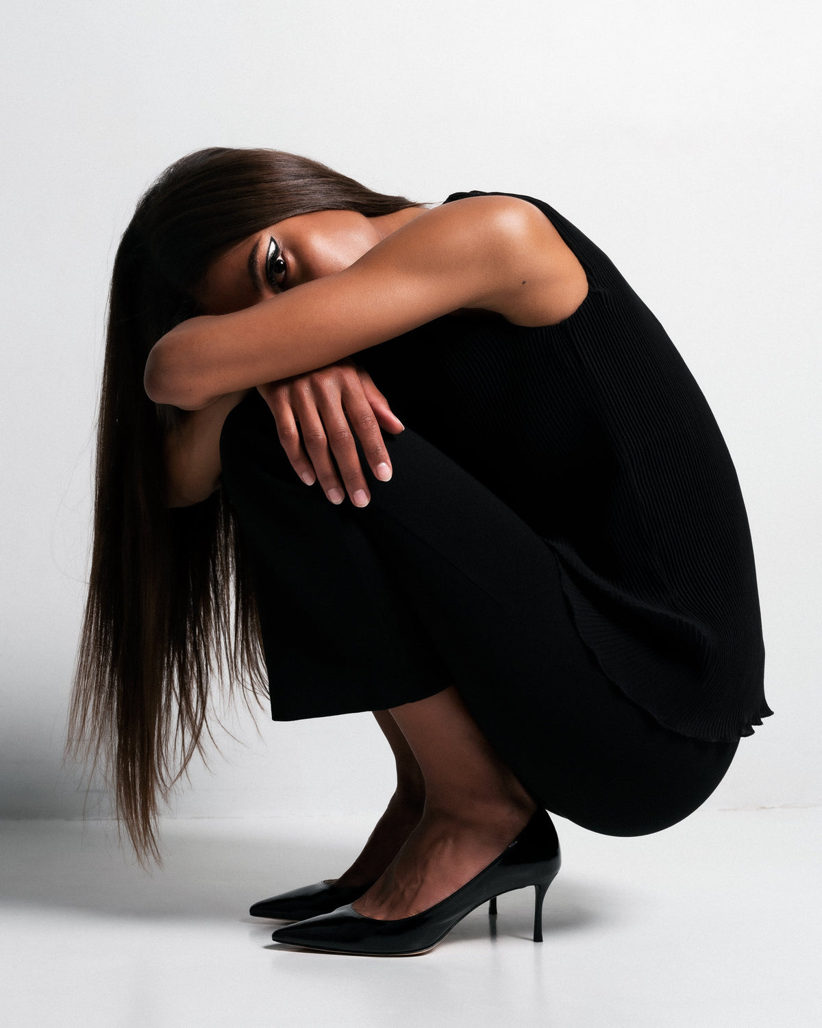 Bikkou 10AM Monday at the Office vegan black patent pumps on model
