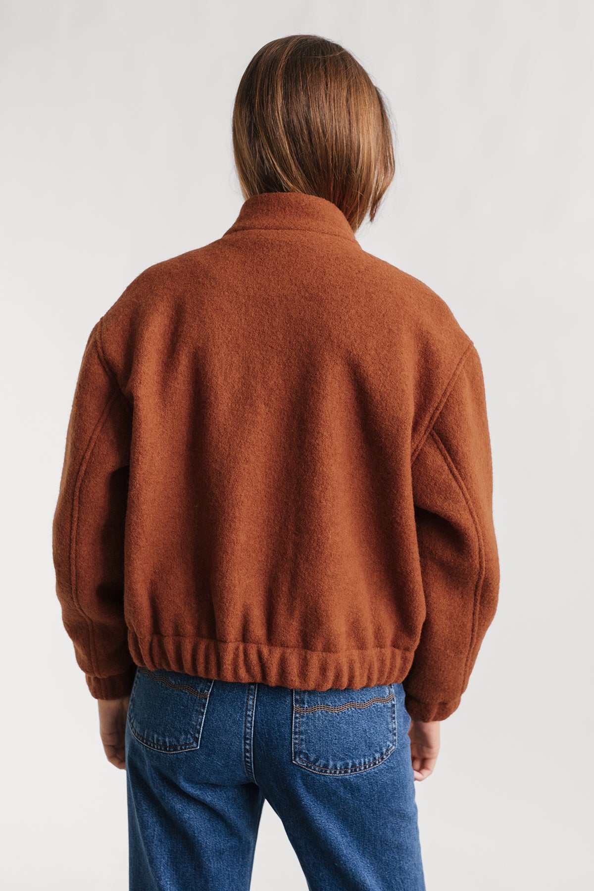 Veste Bushmill orange en laine feutrée par TWOTHIRDS