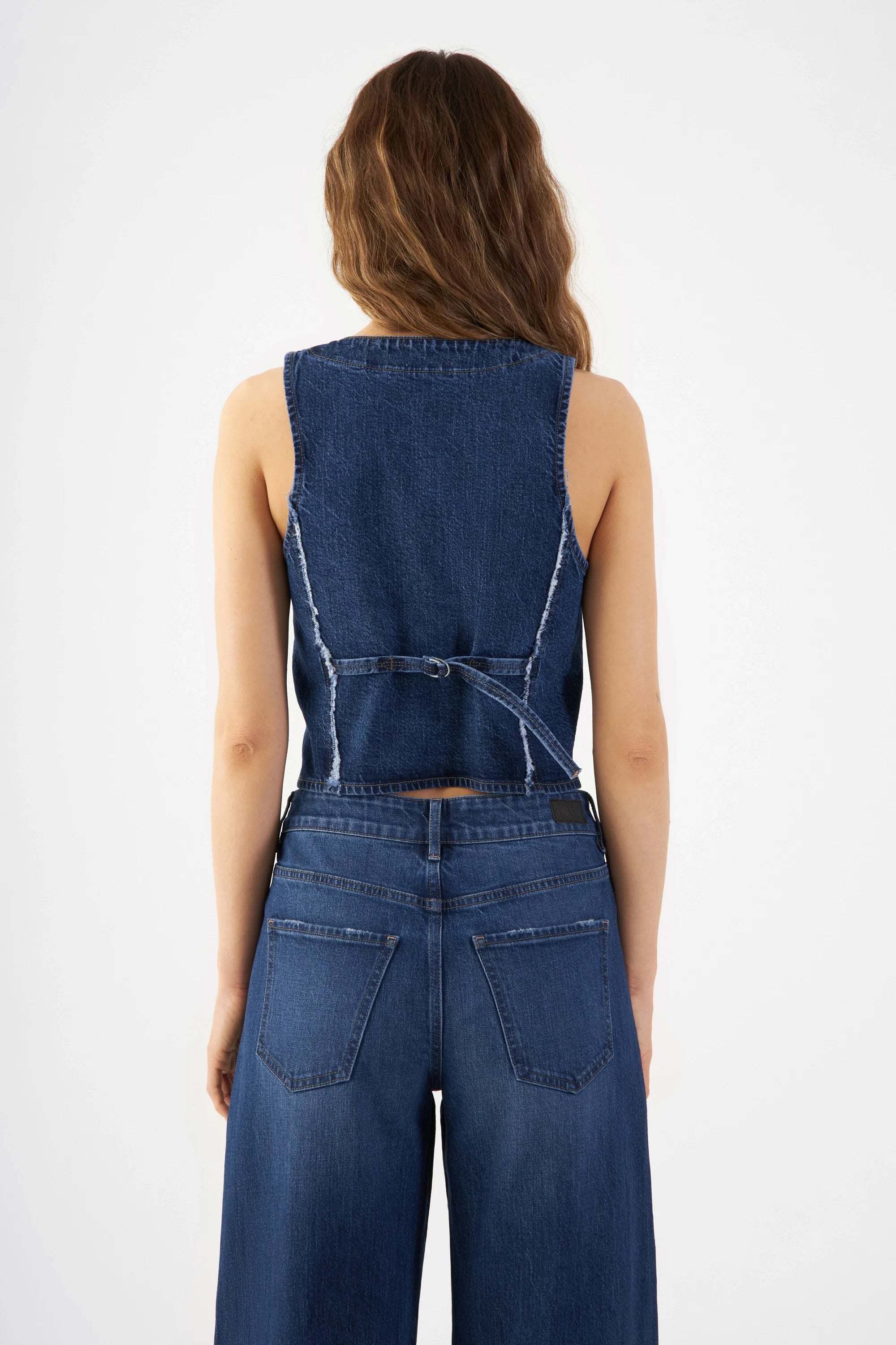 Dark blue ASTRA denim vest made from organic cotton by Dawn Denim