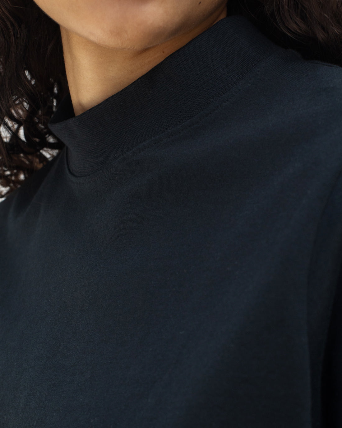Black T-shirt made of 100% organic cotton by Rotholz