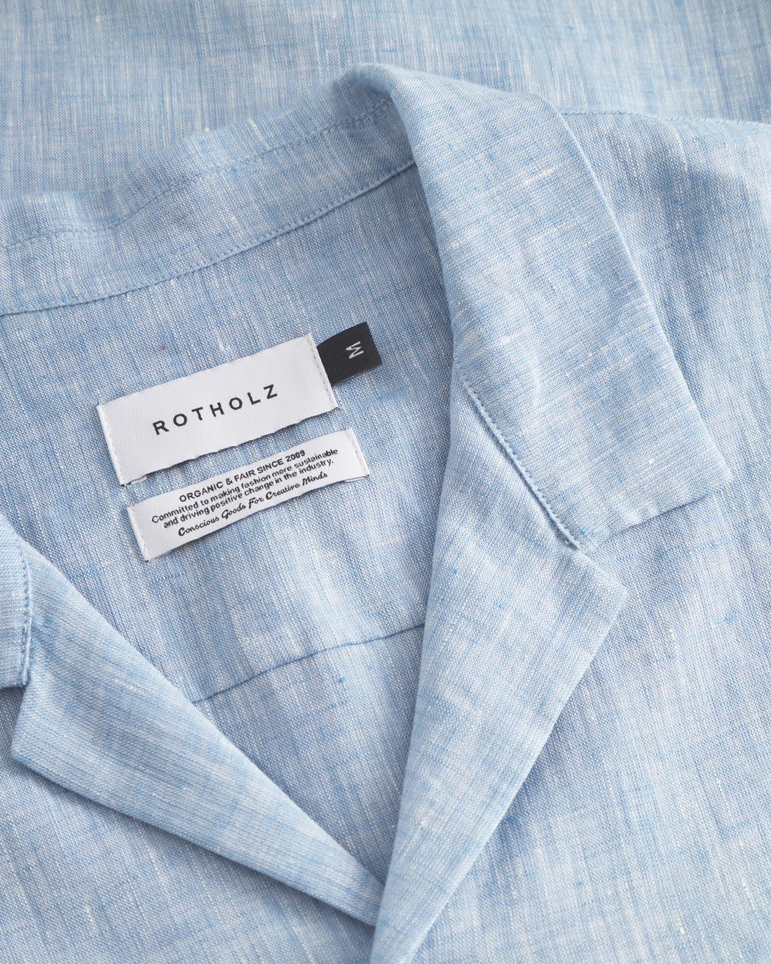 Blue bowling shirt made from 100% organic cotton by Rotholz