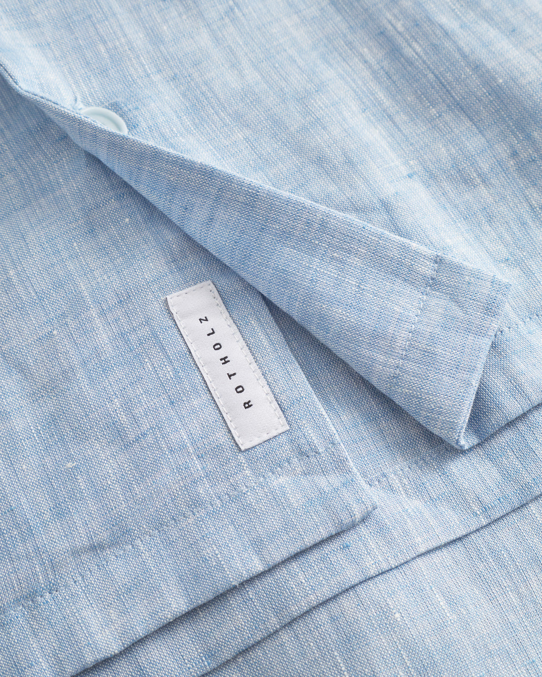 Blue bowling shirt made from 100% organic cotton by Rotholz