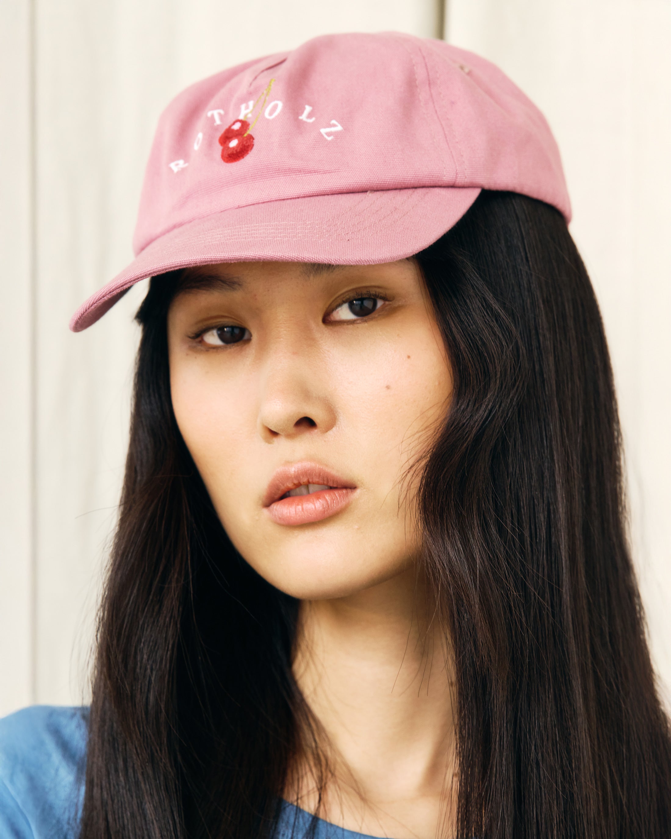 Pinke Cap Floppy Cherry Logo aus Bio-Baumwolle von Rotholz