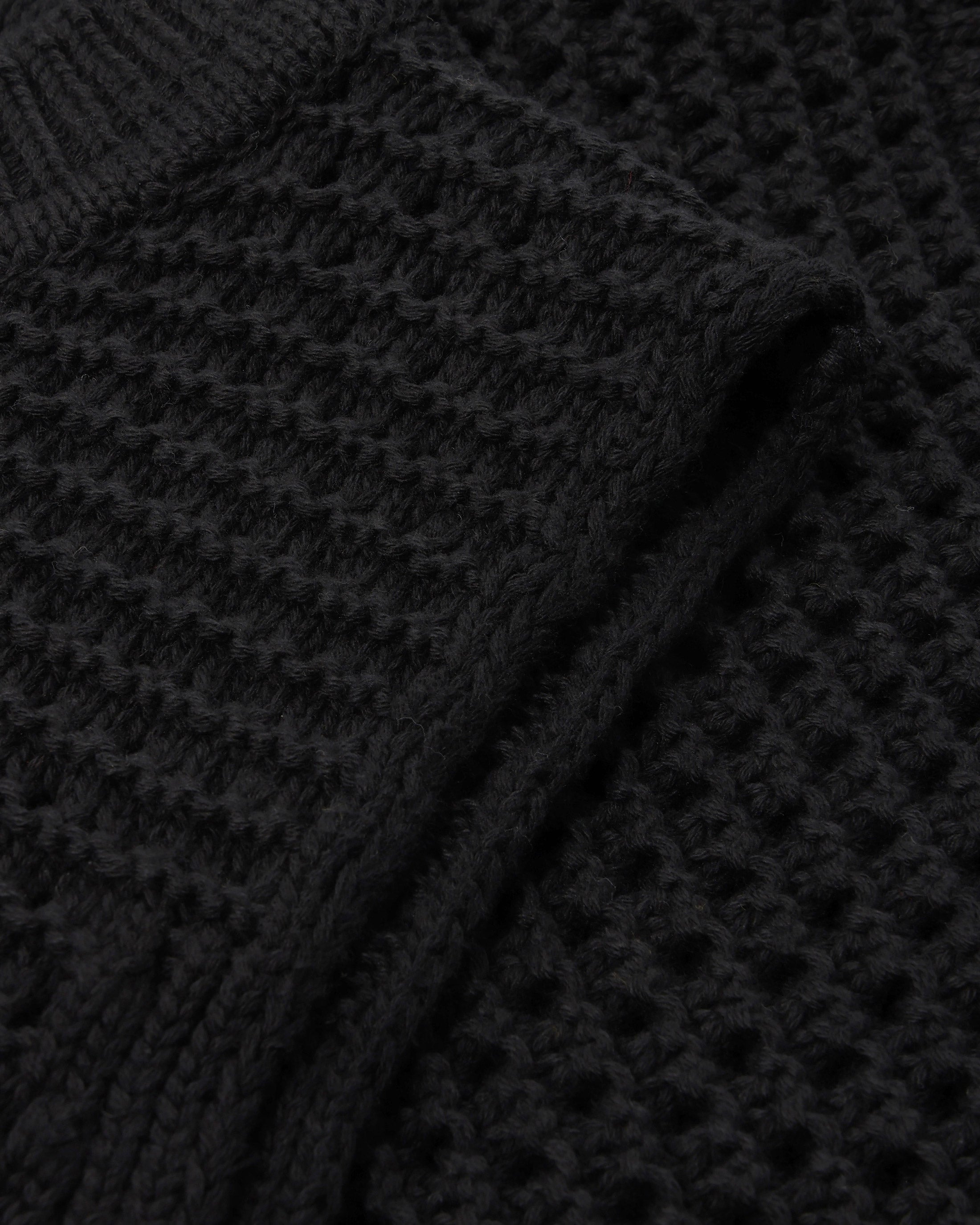 Gilet tricoté noir en 100 % coton biologique de Rotholz