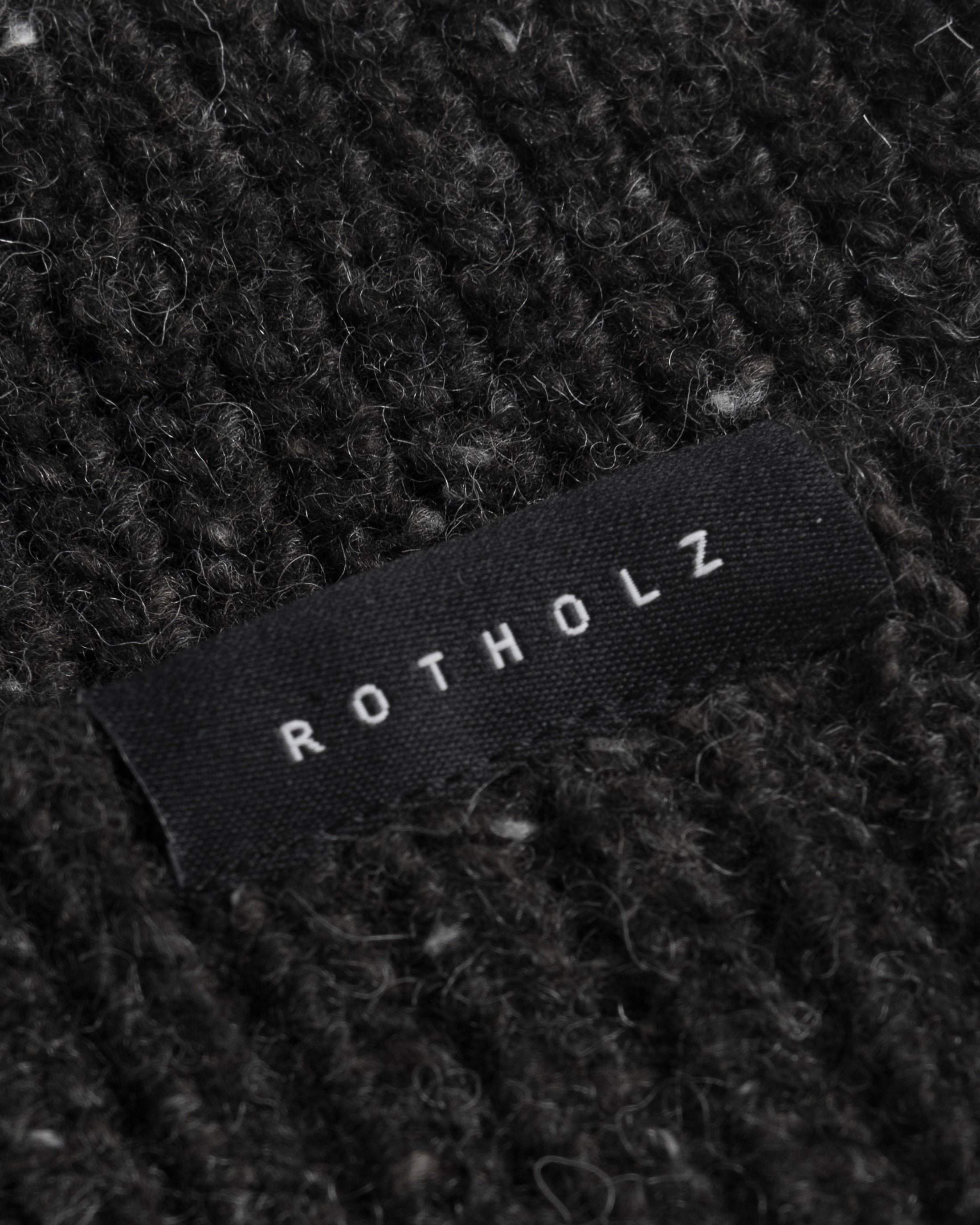 Schwarze Kurze Mütze aus Merinowolle von Rotholz