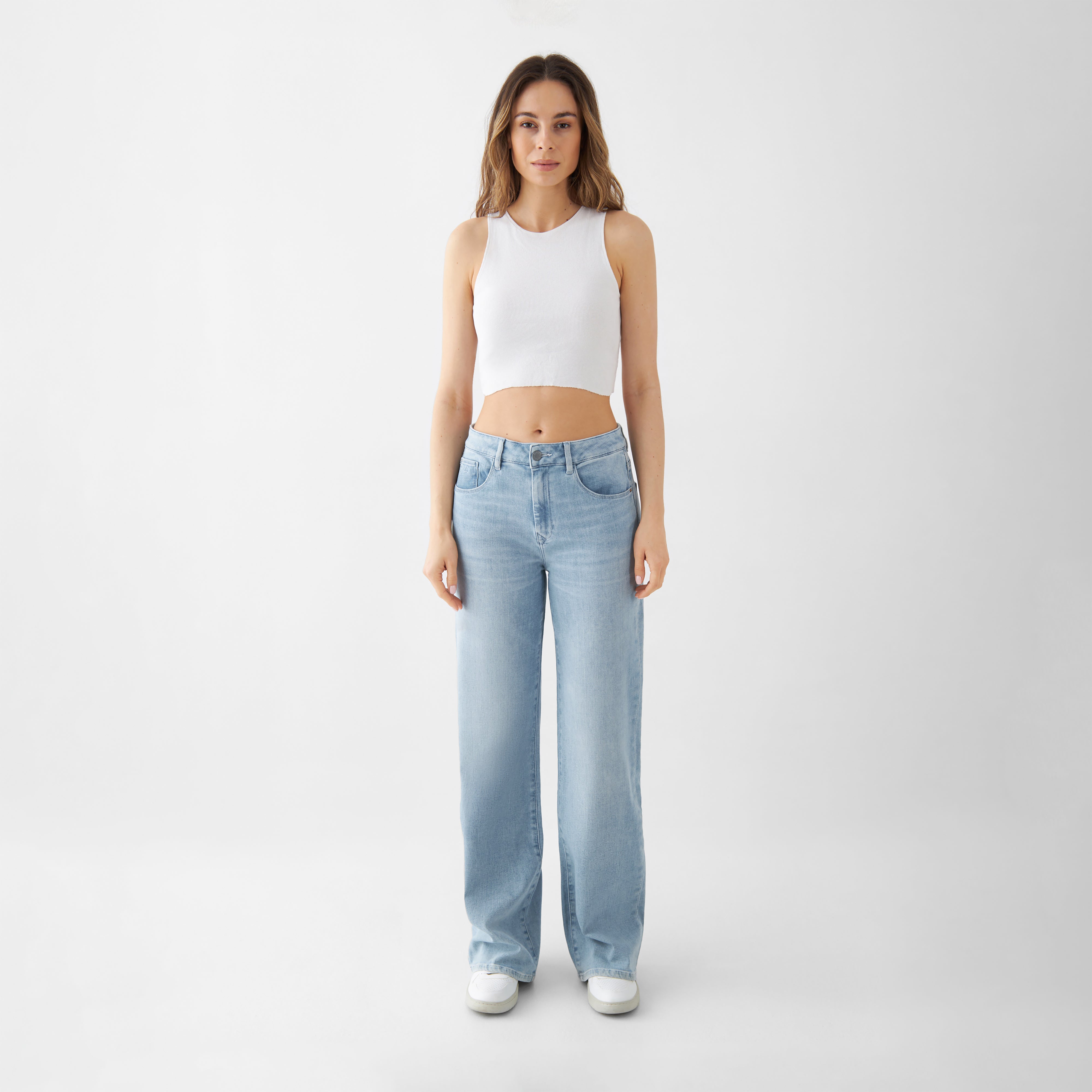 Light blue DEW Flared jeans made from organic cotton by Dawn Denim