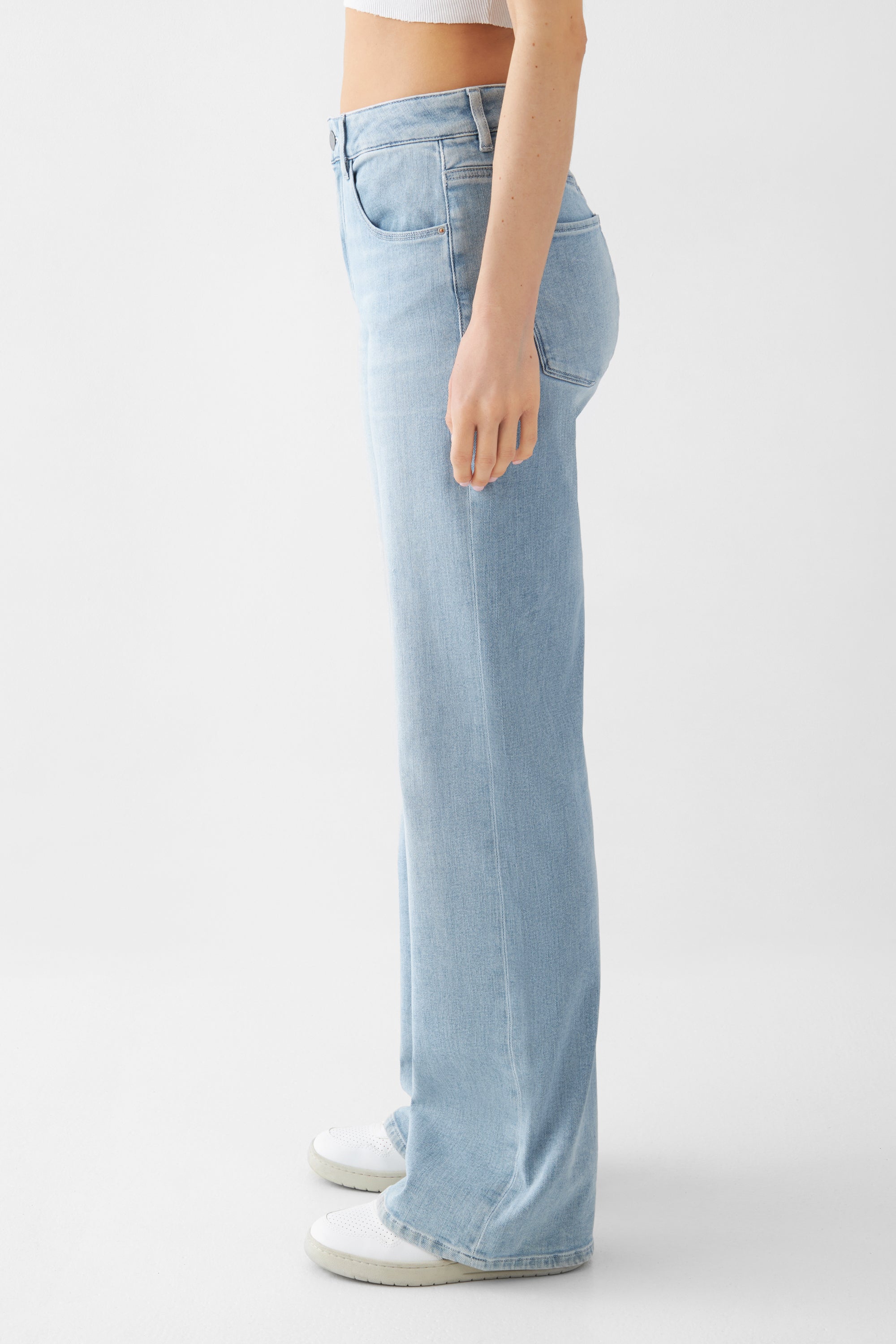 Light blue DEW Flared jeans made from organic cotton by Dawn Denim