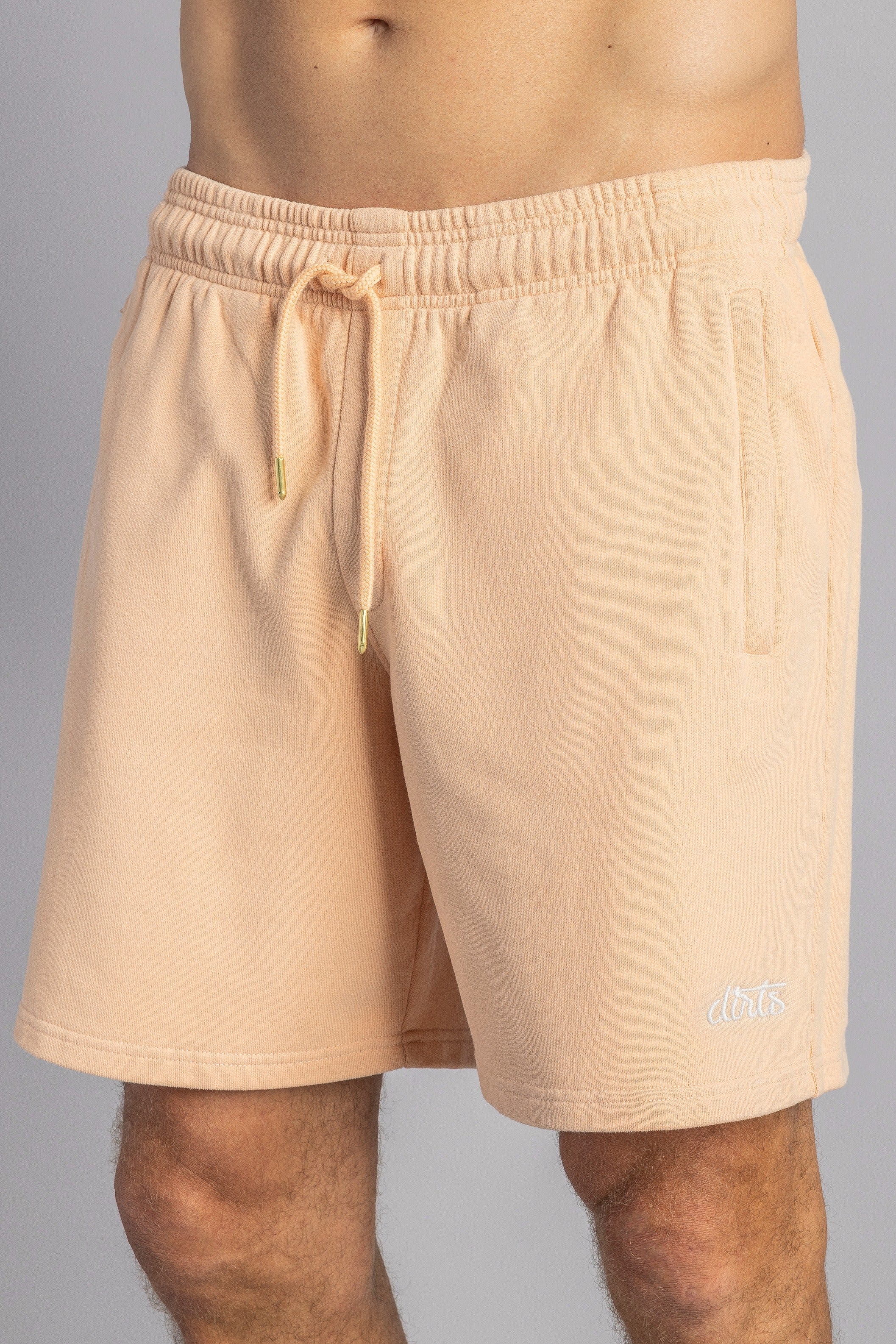 Short de survêtement orange clair en coton 100% biologique de DIRTS