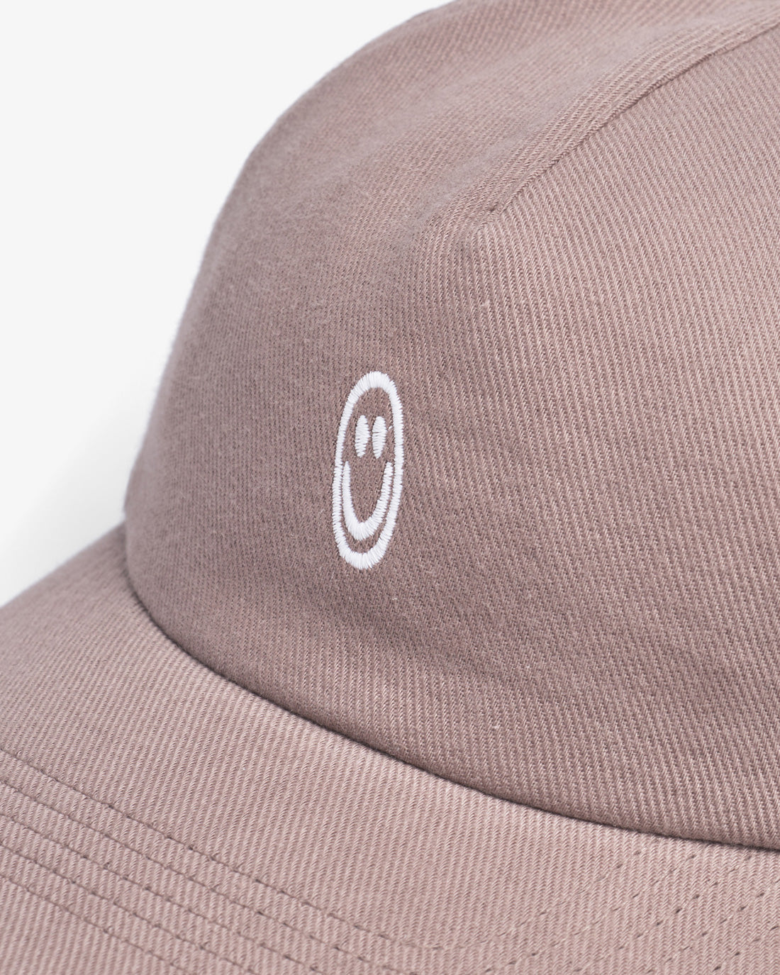 Brown Smiling Floppy Cap made from 100% organic cotton by Rotholz