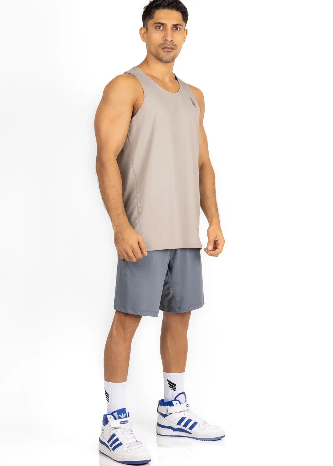 Grey Zeyla Performance tank top made from recycled polyester by Nivays