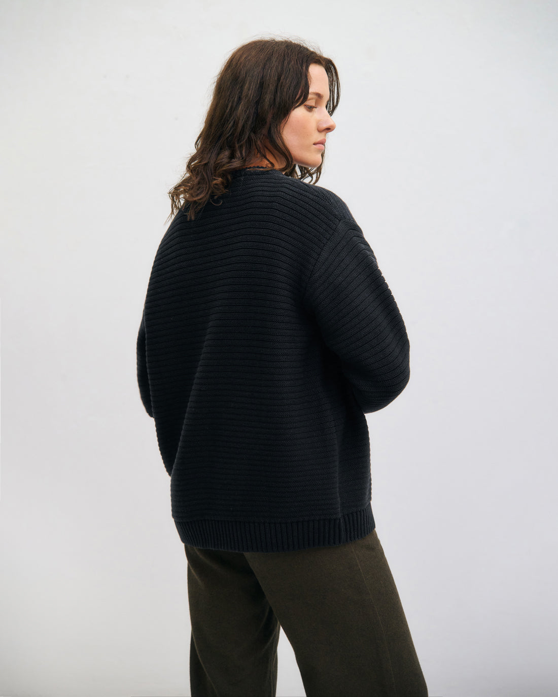 Black ribbed knit sweater made from 100% organic cotton by Rotholz