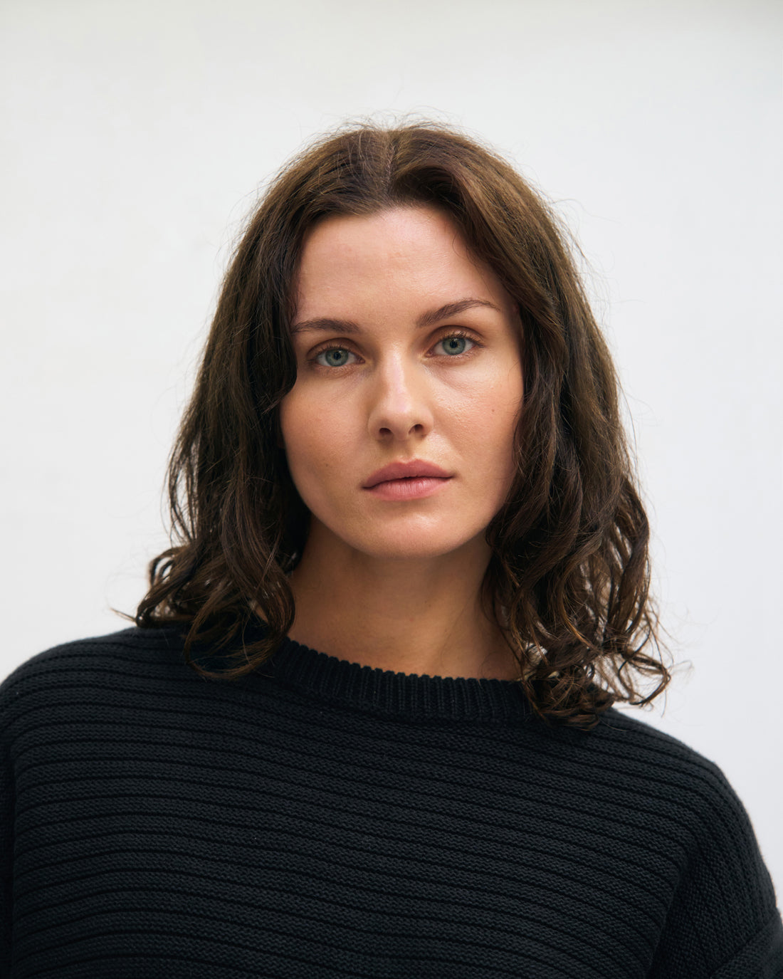 Black ribbed knit sweater made from 100% organic cotton by Rotholz