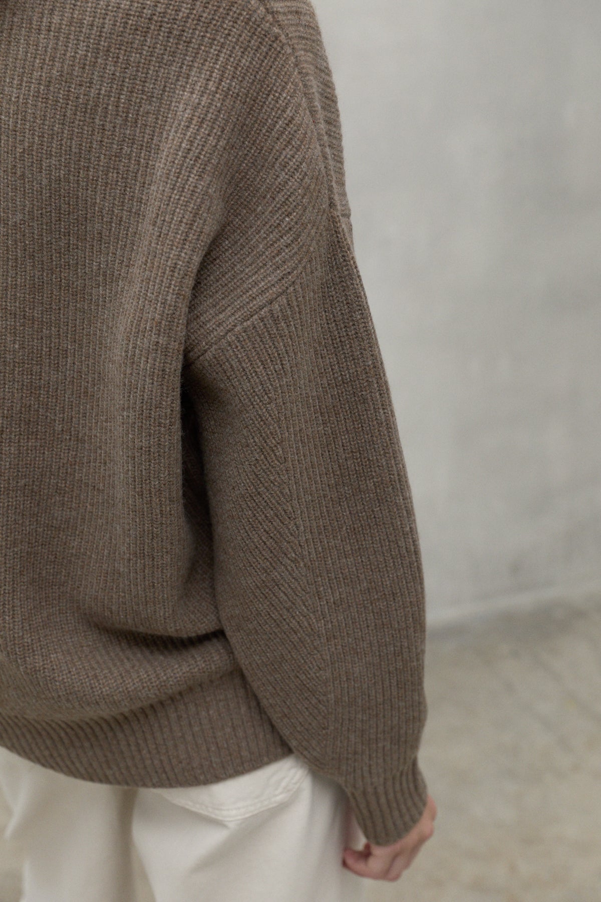 Elegant knitted sweater made of 100% recycled cotton by ECOALF in dark brown