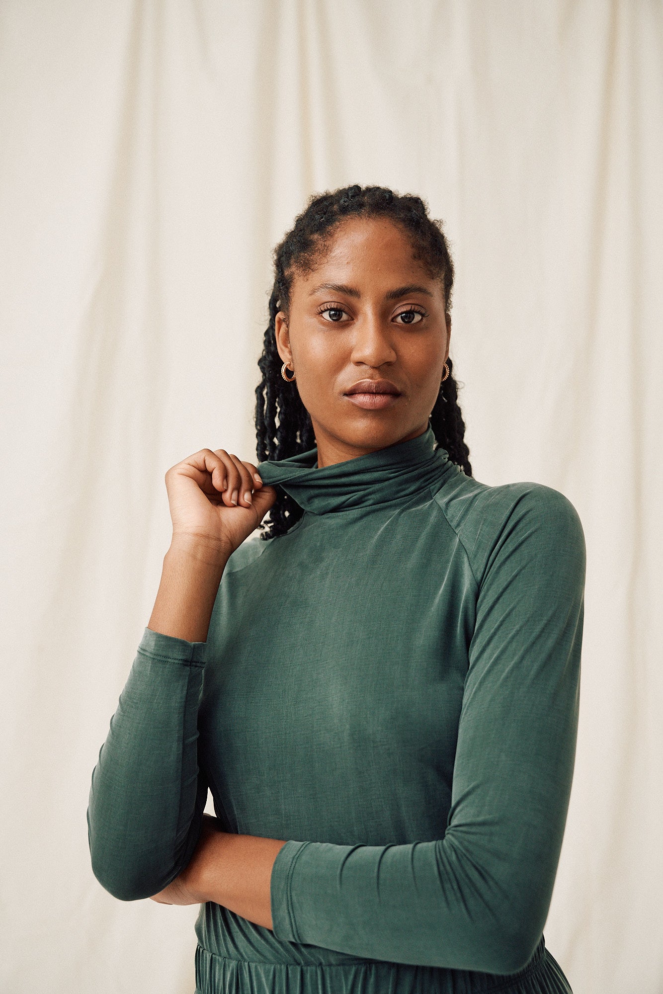 Green cupro turtleneck top by MOYA KALA
