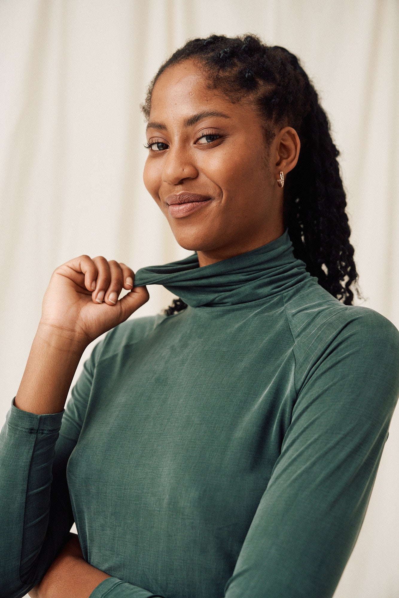 Green cupro turtleneck top by MOYA KALA