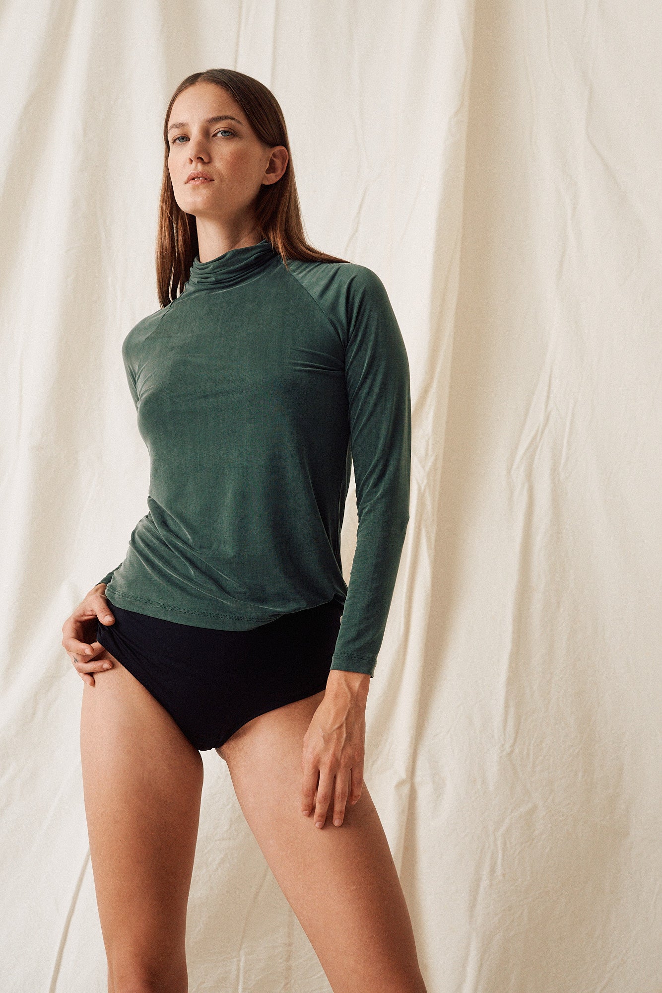 Green cupro turtleneck top by MOYA KALA