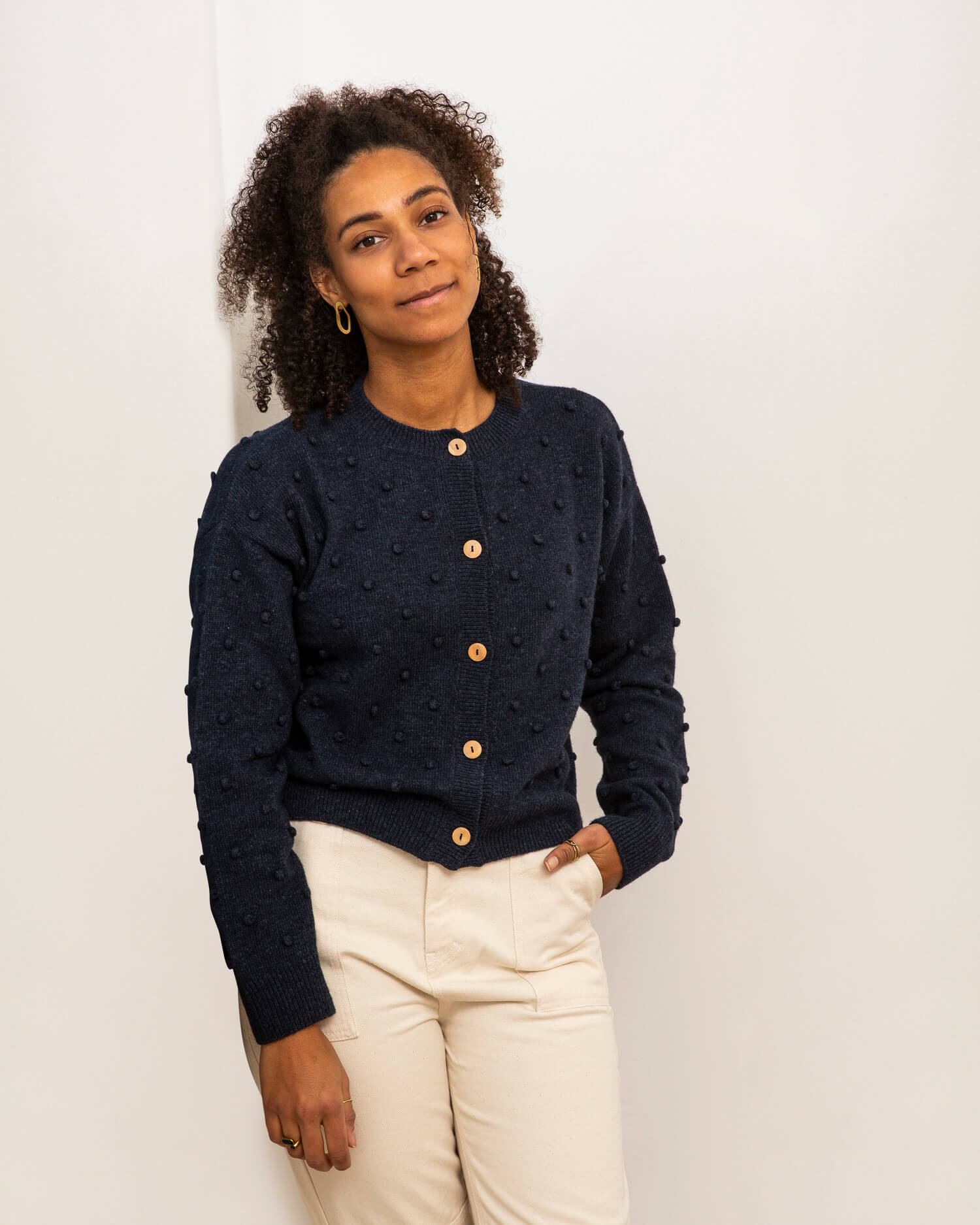 Dark blue Popcorn cardigan made from recycled wool by Matona