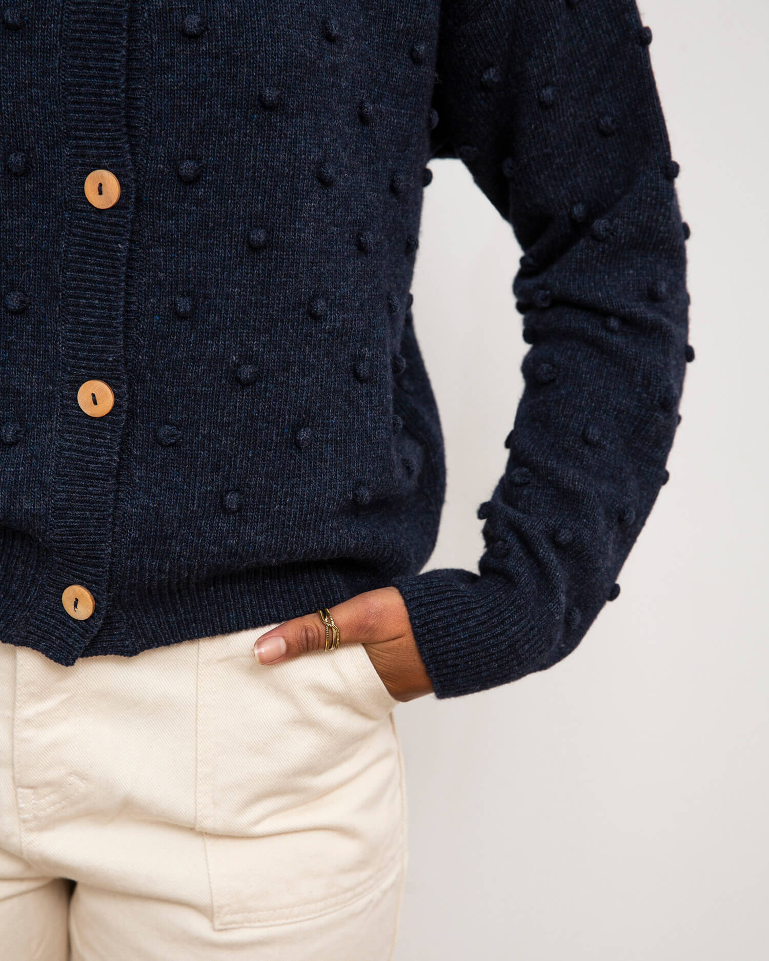 Dark blue Popcorn cardigan made from recycled wool by Matona