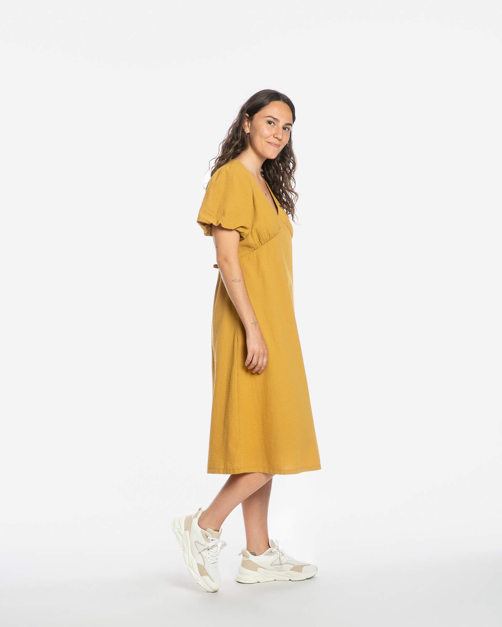 Dark yellow V-neck dress made from 100% organic cotton by Matona