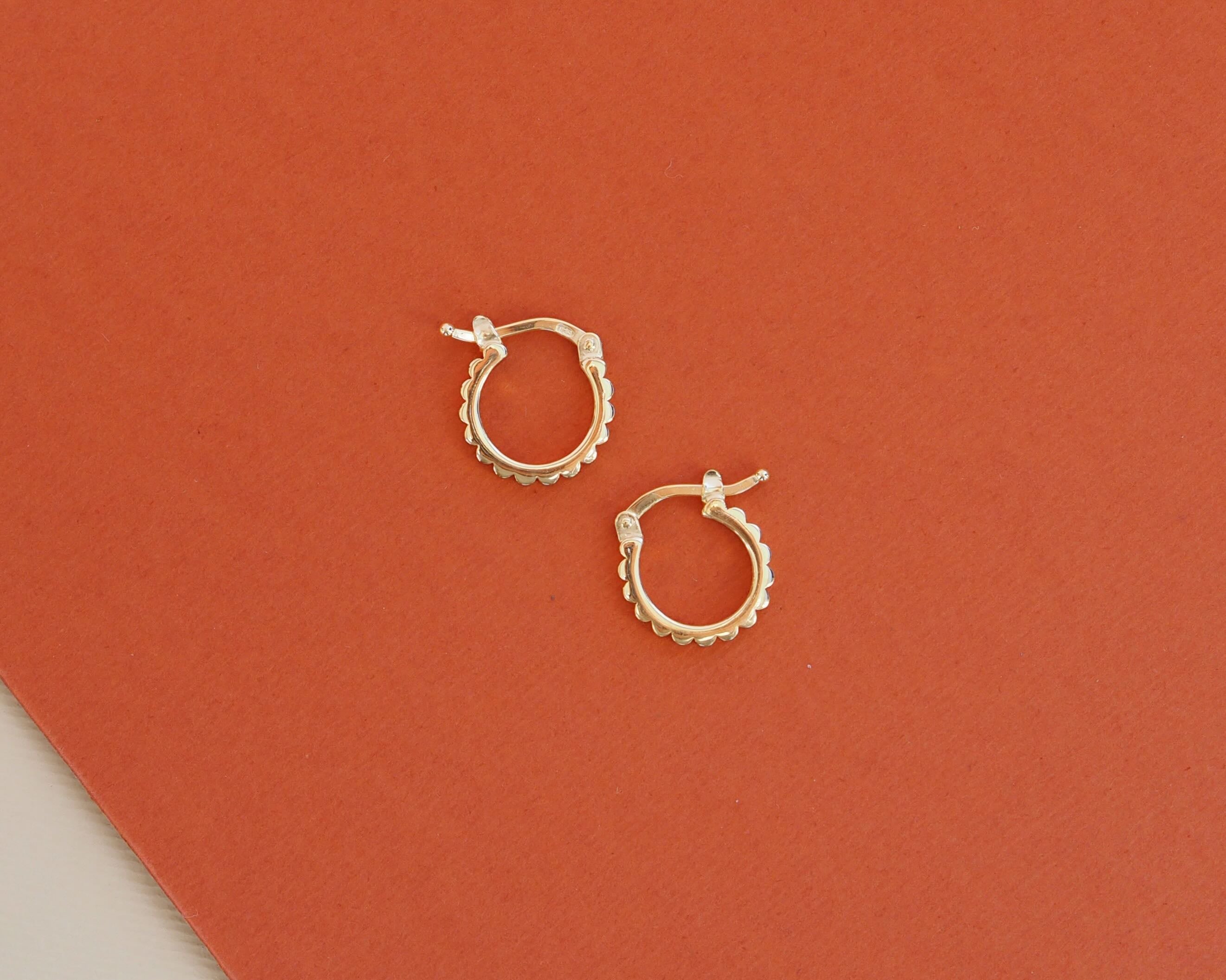 INGRANAGGI mini hoop earrings with clasp