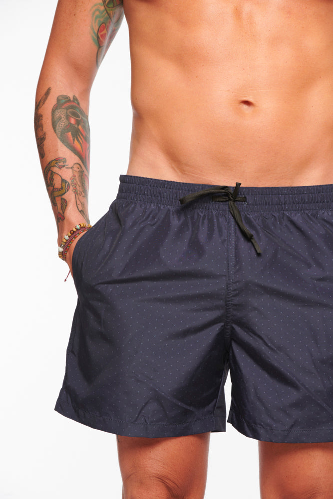 Navy blue HONU swim shorts from PURA Clothing