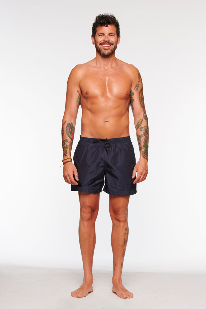 Navy blue HONU swim shorts from PURA Clothing