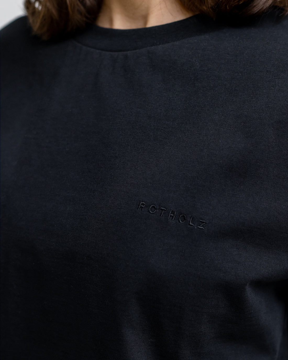 Black T-shirt logo made from 100% organic cotton from Rotholz