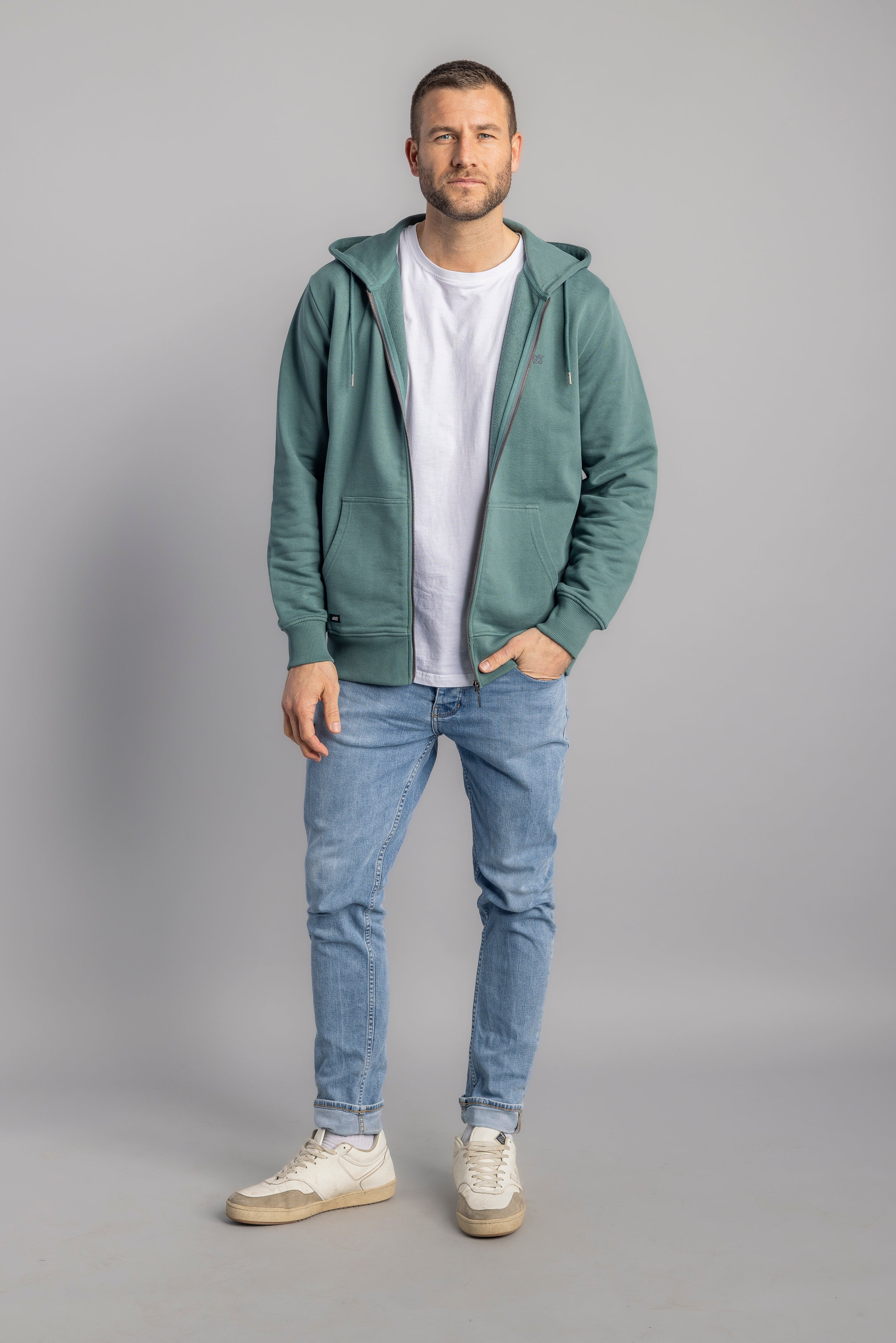 Green zip hoodie made from 100% organic cotton from DIRTS