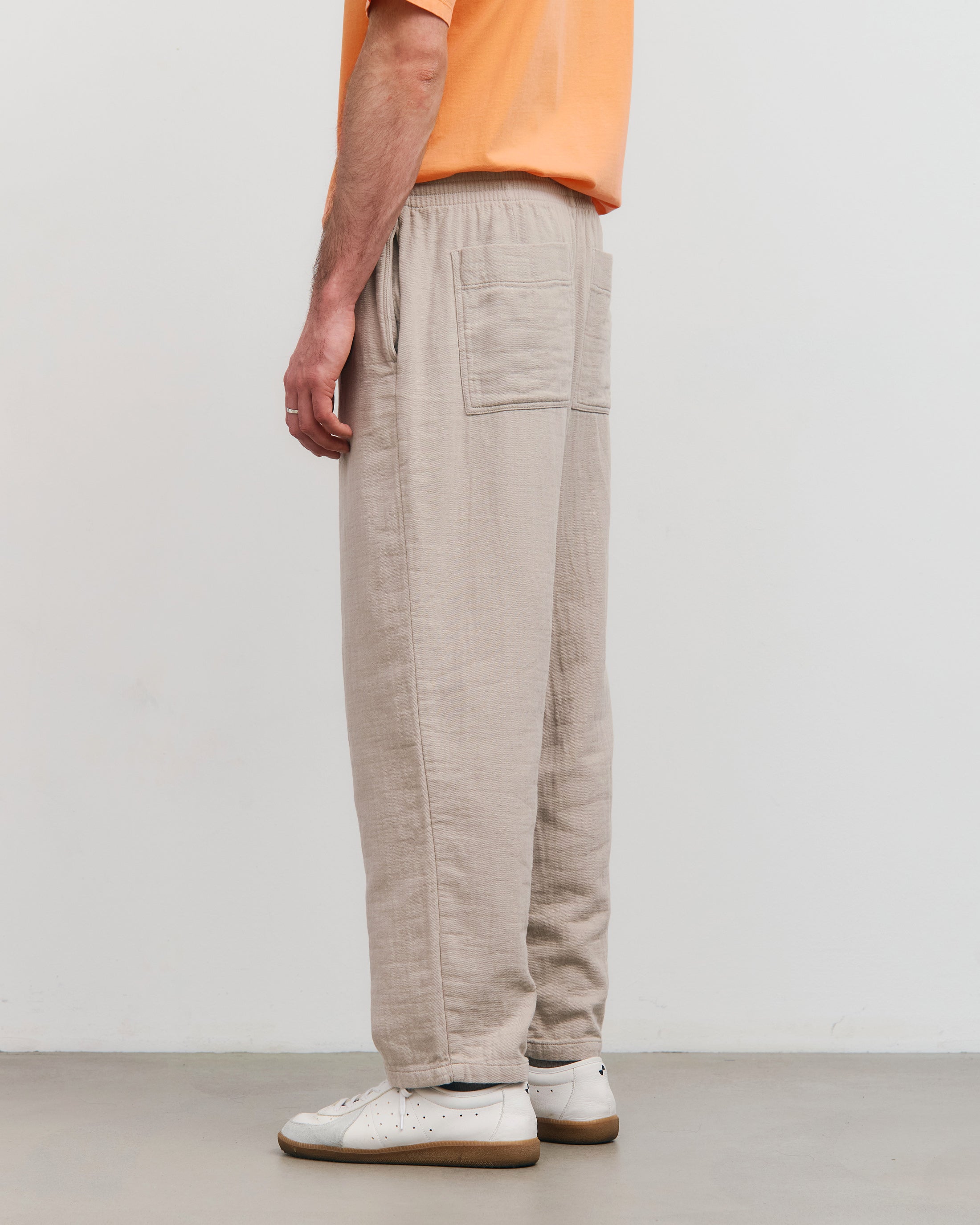 Beige wide trousers made from 100% organic cotton by Rotholz