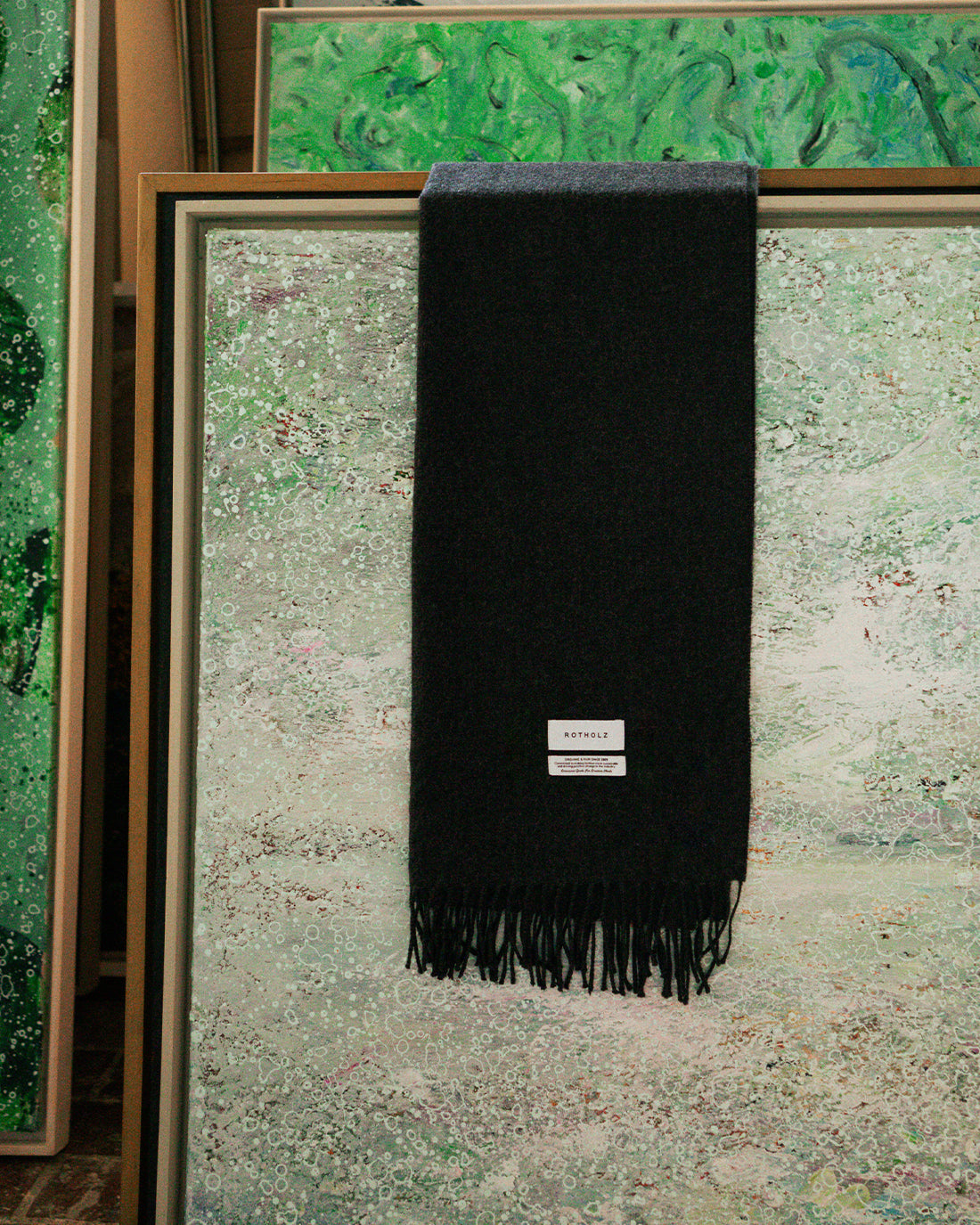 Black woven scarf made of 100% merino wool by Rotholz