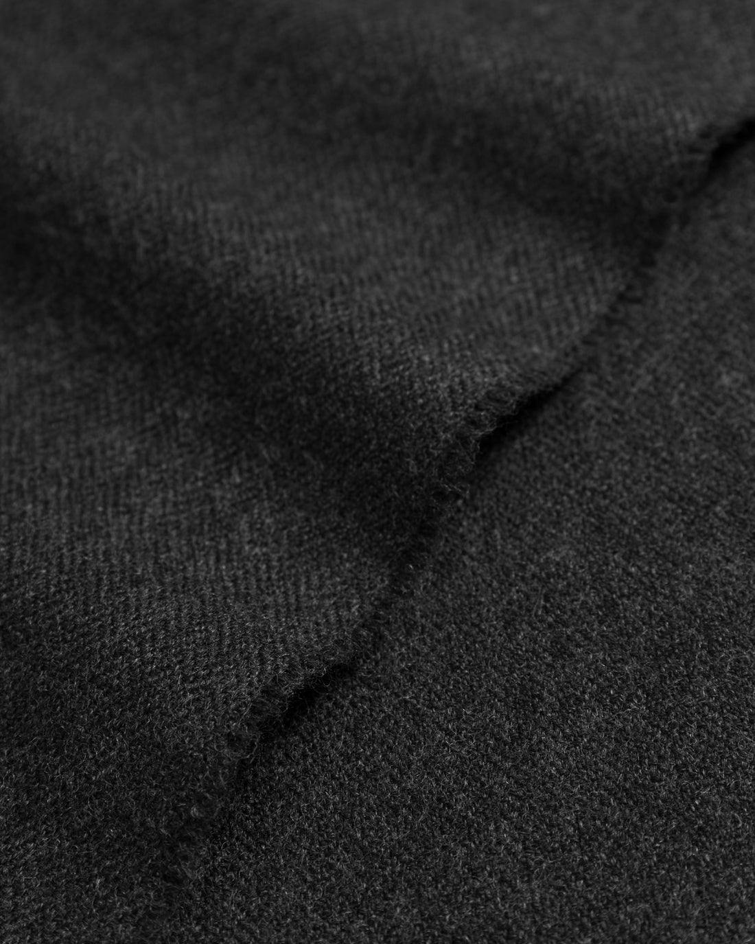 Black woven scarf made of 100% merino wool by Rotholz