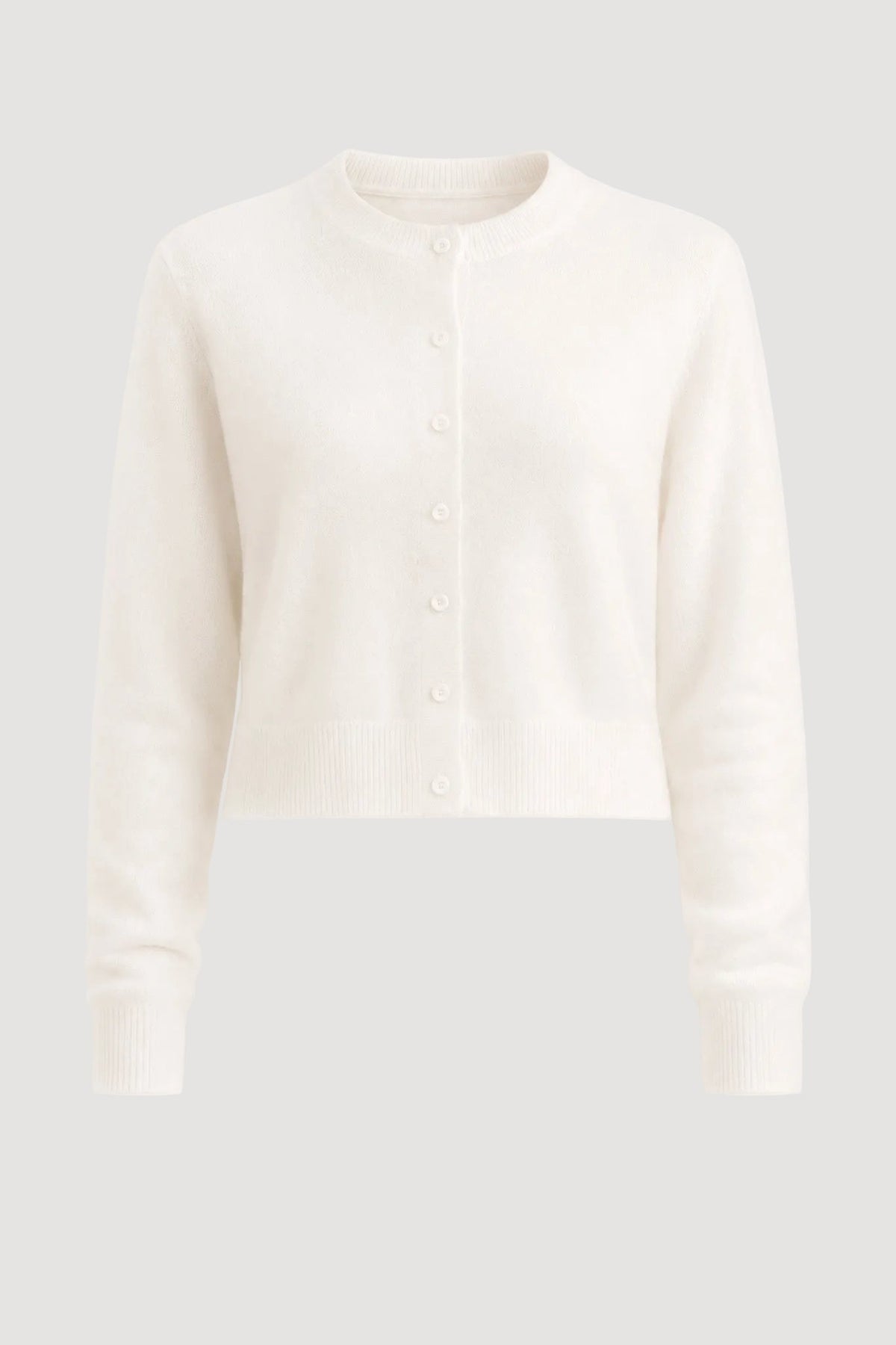 Weisse Strickjacke aus 100% Merinowolle von Pura Clothing