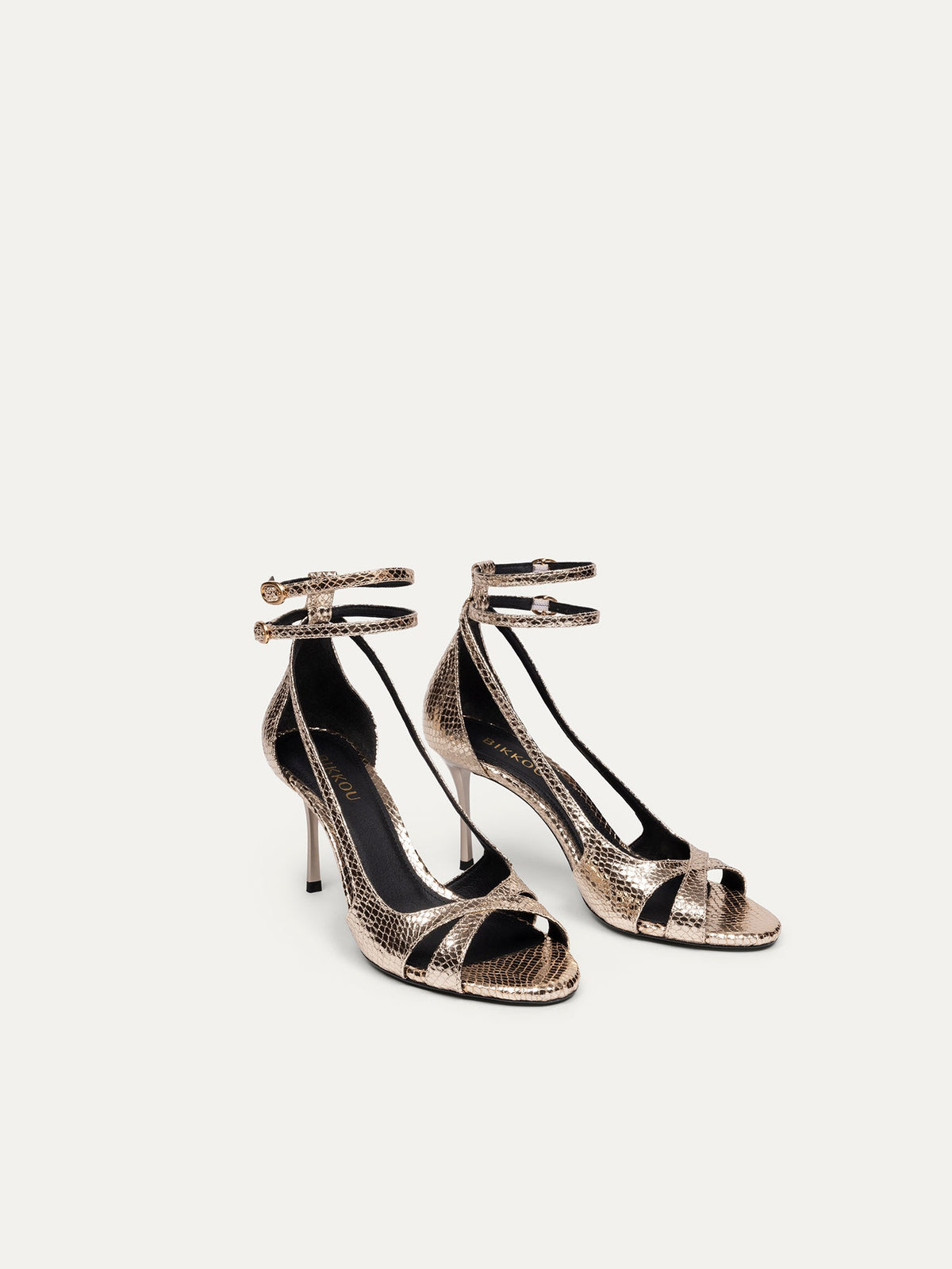 Bikkou 9PM Drinks with Friends vegan gold python heeled sandals side view