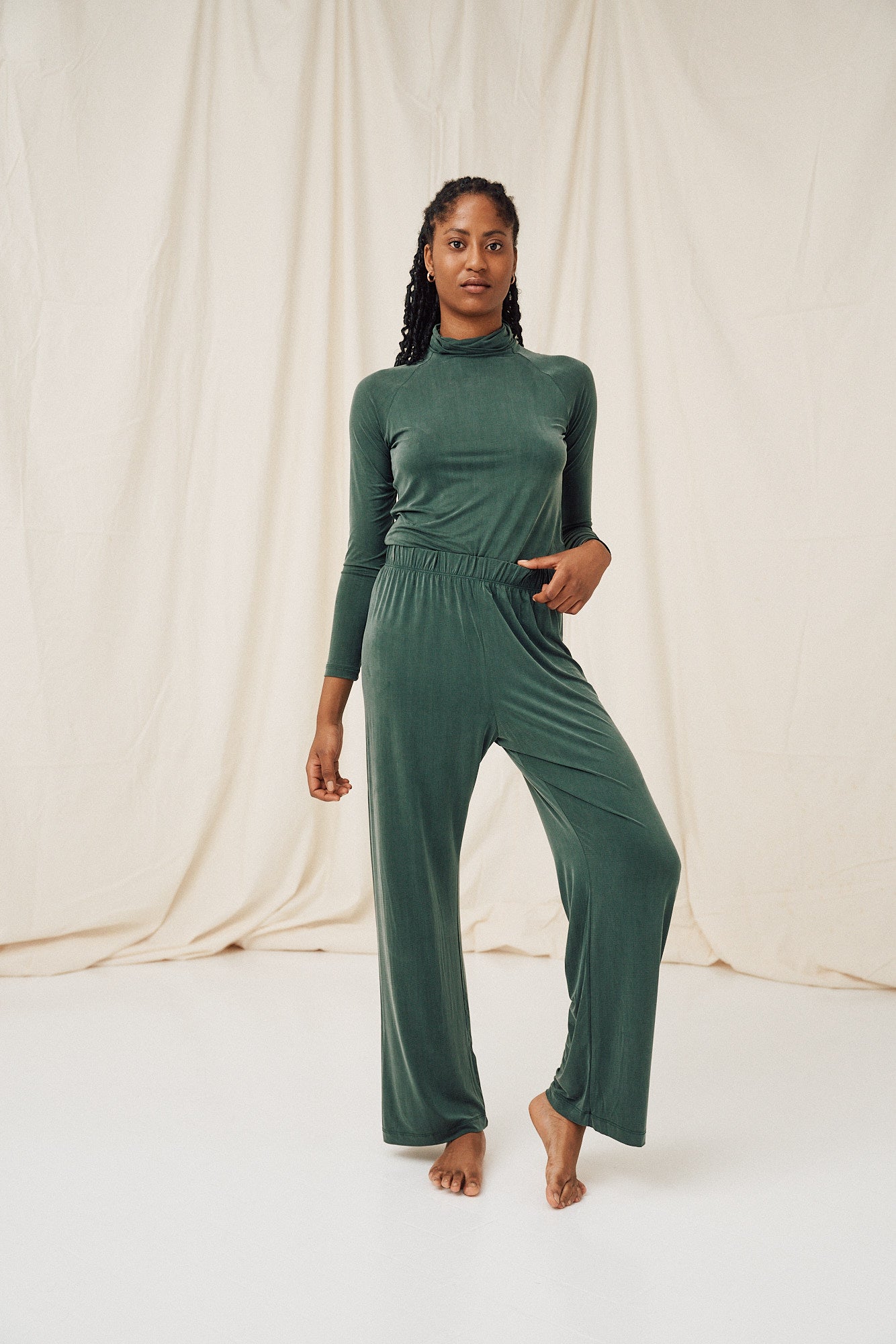 Green high waist pants made of cupro by MOYA KALA