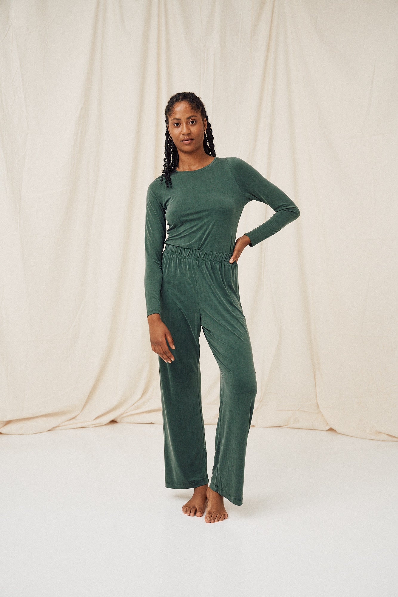 Green high waist pants made of cupro by MOYA KALA