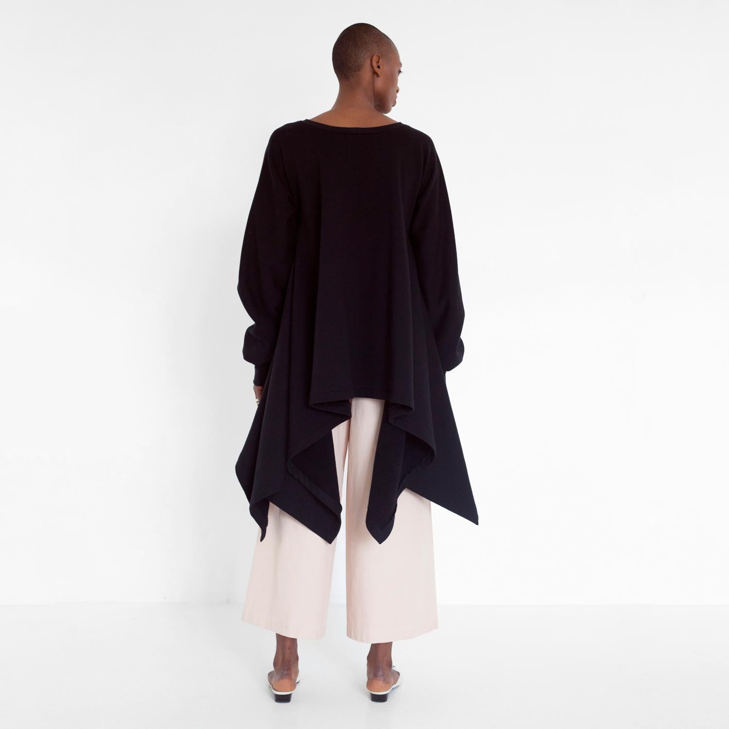 Flowy oversized sweater with bell sleeves
